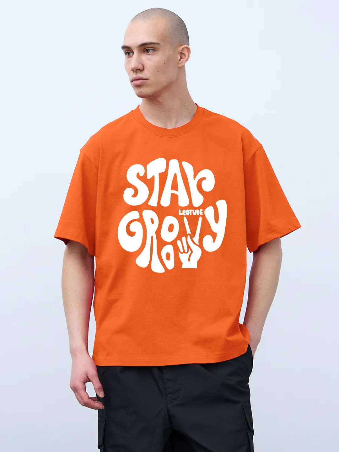     			Leotude Men Cotton Blend Oversized Fit Printed T-Shirt ( Orange )