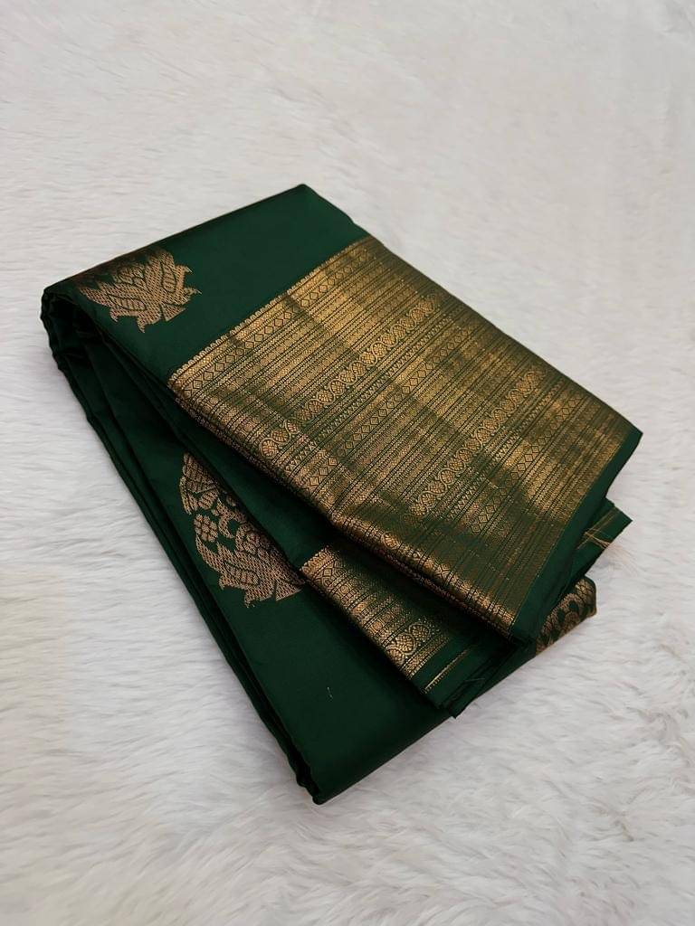 WOVEN STOCK Silk Self Design Banarasi saree With Unstitched Blouse Piece ( Green )     			WOVEN STOCK Silk Self Design Banarasi saree With Unstitched Blouse Piece ( Green )