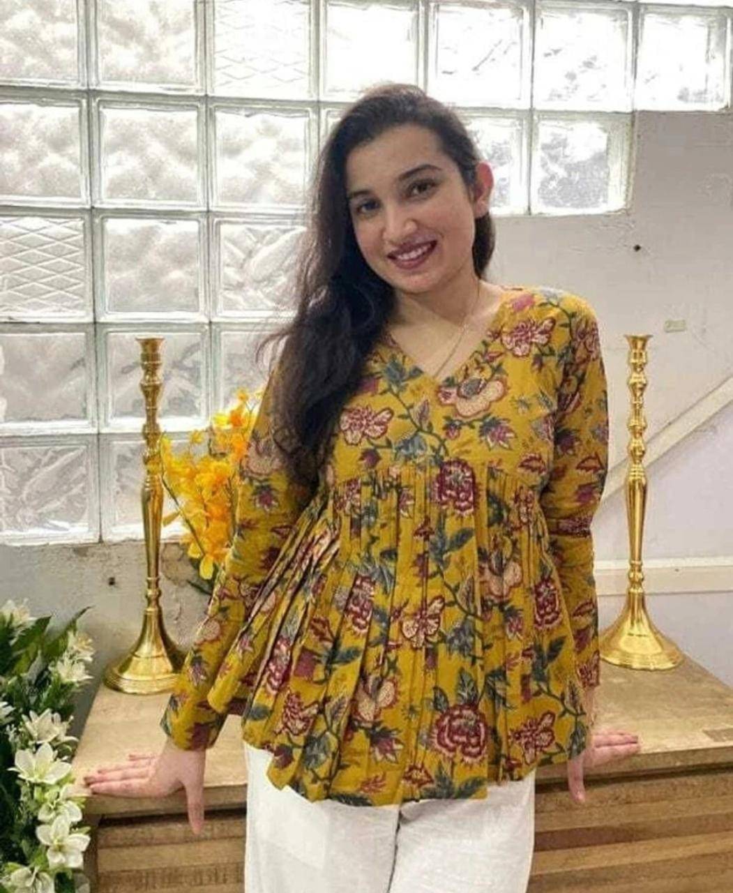     			JOGINI Women Rayon Printed A-line Kurti ( Yellow )