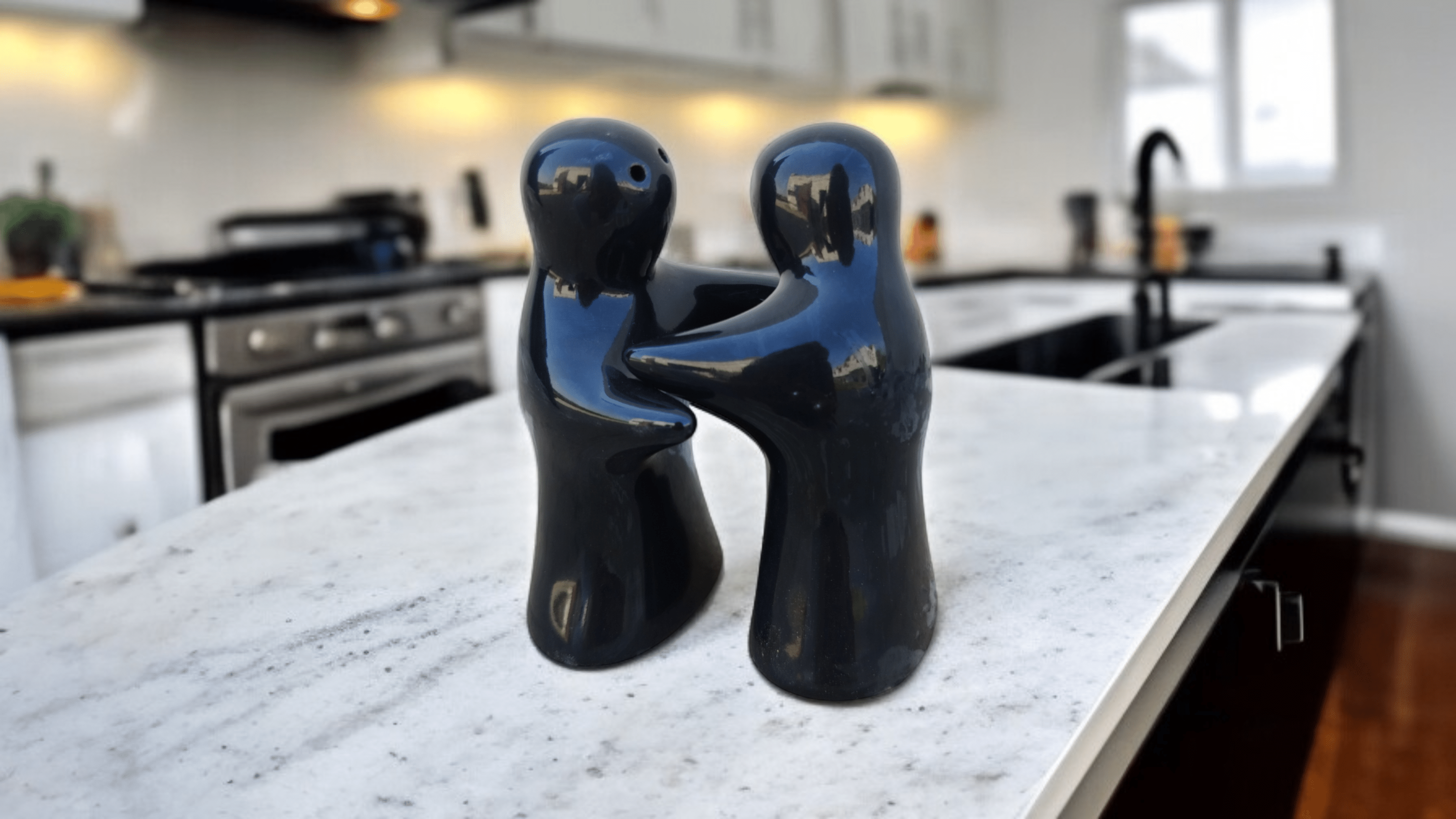 Malaikah Ghost Shaker Ceramic Black Salt/Pepper Container ( Set of 2 ) Malaikah Ghost Shaker Ceramic Black Salt/Pepper Container ( Set of 2 )