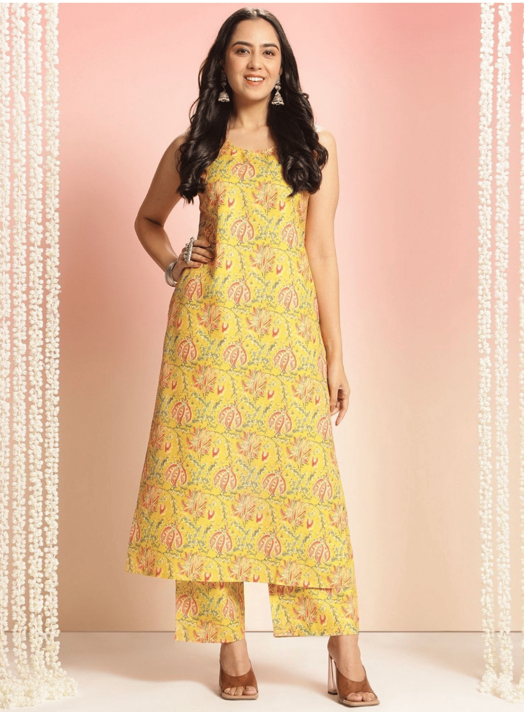 Jinal Creation Women Rayon Self Design A-line Kurti With Pants ( Yellow ) Jinal Creation Women Rayon Self Design A-line Kurti With Pants ( Yellow )
