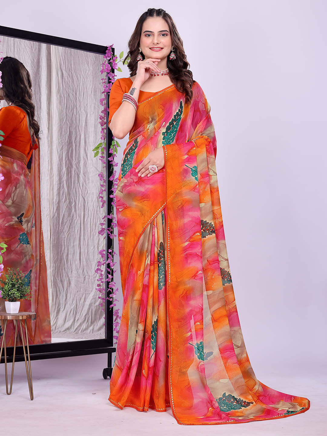 Maayro Georgette Printed Bandhani Sarees With Unstitched Blouse Piece ( Orange ) Maayro Georgette Printed Bandhani Sarees With Unstitched Blouse Piece ( Orange )