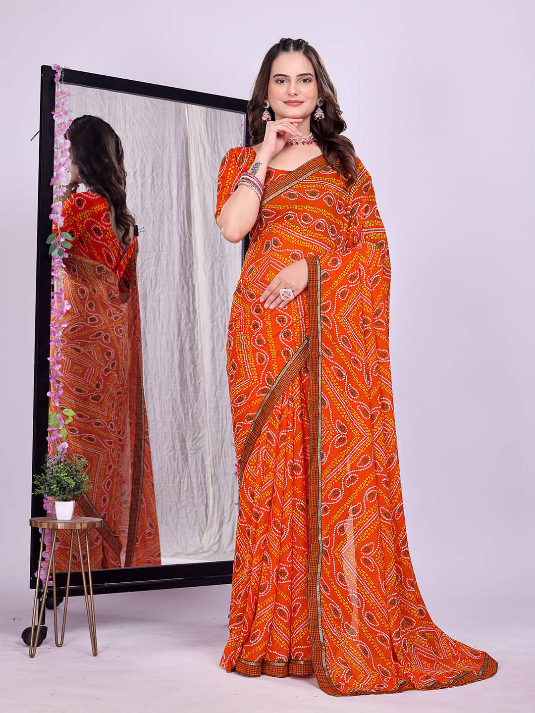 Maayro Georgette Printed Bandhani Sarees With Unstitched Blouse Piece ( Orange ) Maayro Georgette Printed Bandhani Sarees With Unstitched Blouse Piece ( Orange )