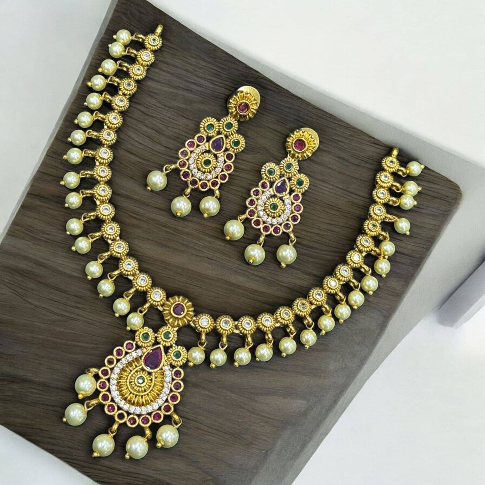     			charming luxe jewel Golden Brass Necklace Set ( Pack of 1 )