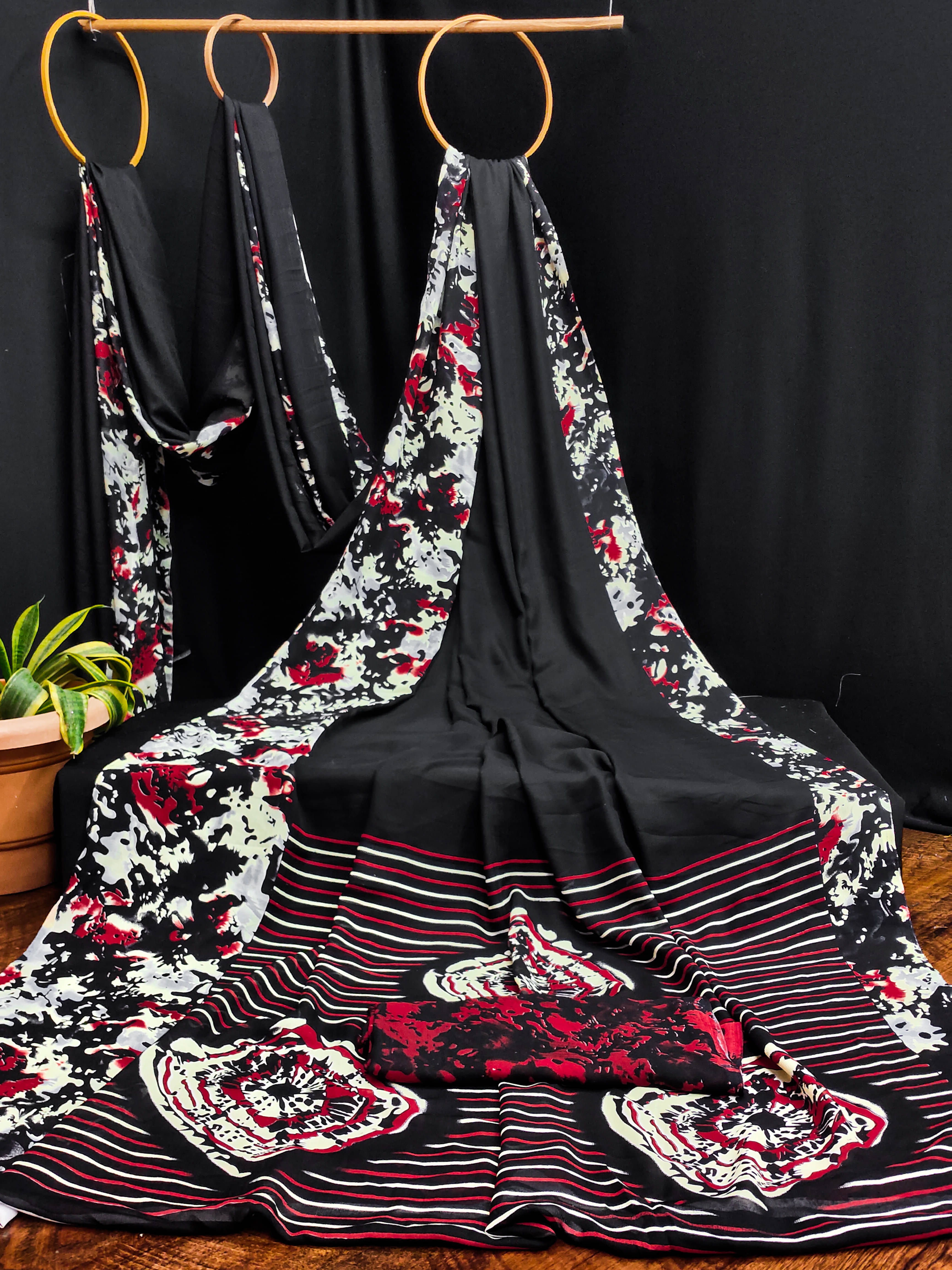 ANAND SAREES Georgette Printed Chanderi saree With Unstitched Blouse Piece ( Black ) ANAND SAREES Georgette Printed Chanderi saree With Unstitched Blouse Piece ( Black )