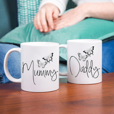     			InShreys Mummy & Daddy Graphic Ceramic Coffee Mug 330 mL ( Pack of 2 )