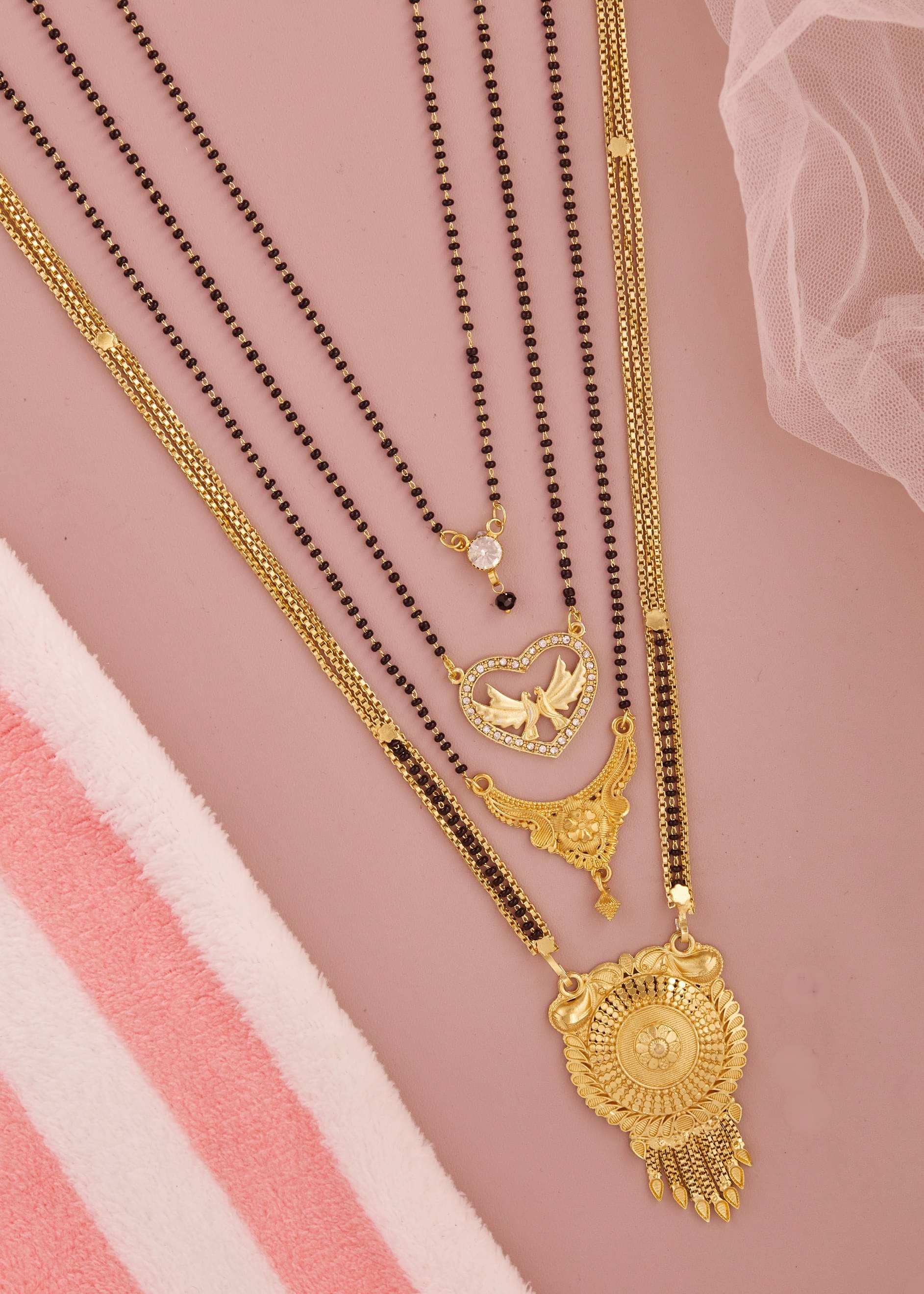 KIEICE Golden Mangalsutra Set ( Pack of 4 )     			KIEICE Golden Mangalsutra Set ( Pack of 4 )