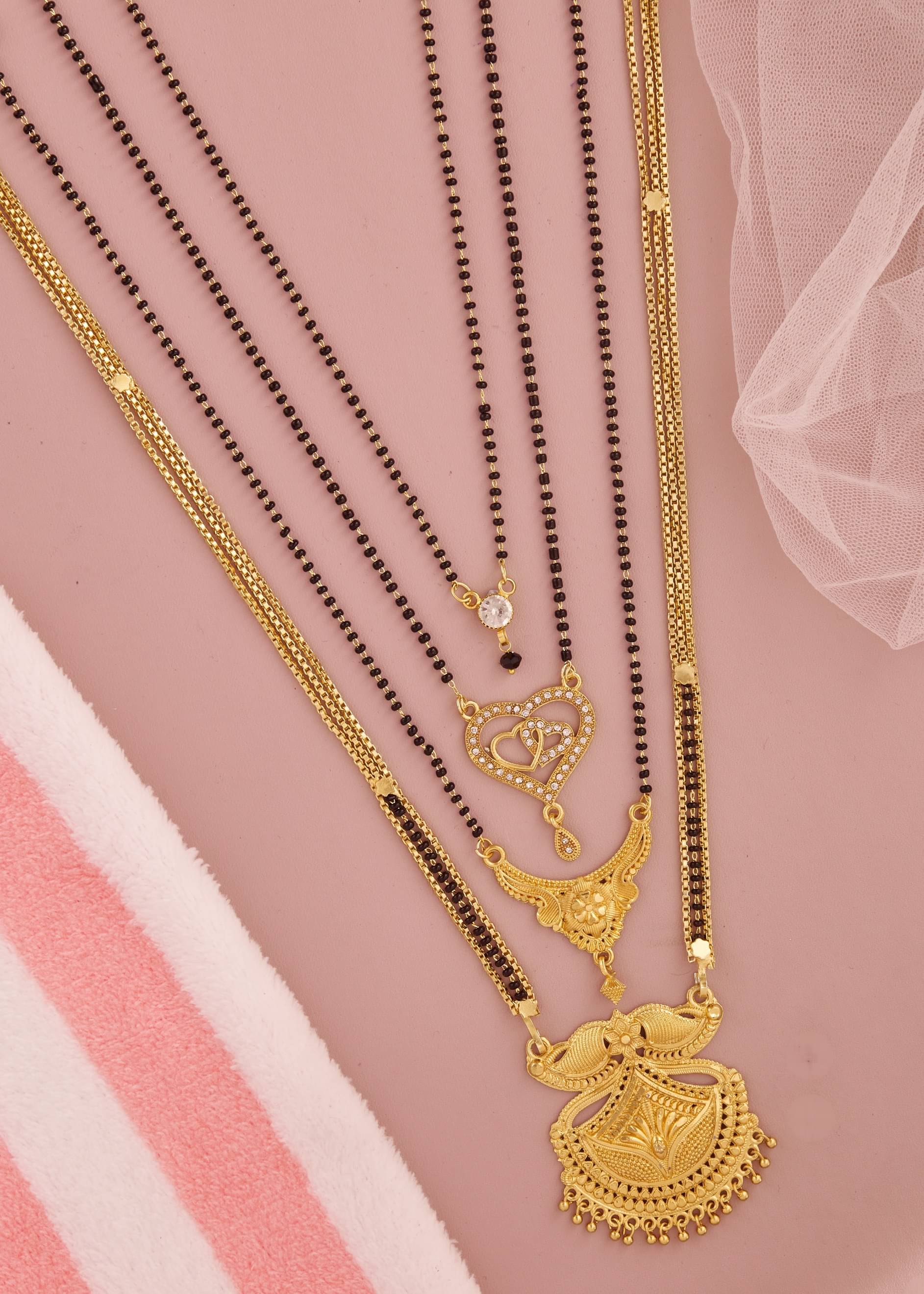 KIEICE Golden Mangalsutra Set ( Pack of 4 )     			KIEICE Golden Mangalsutra Set ( Pack of 4 )