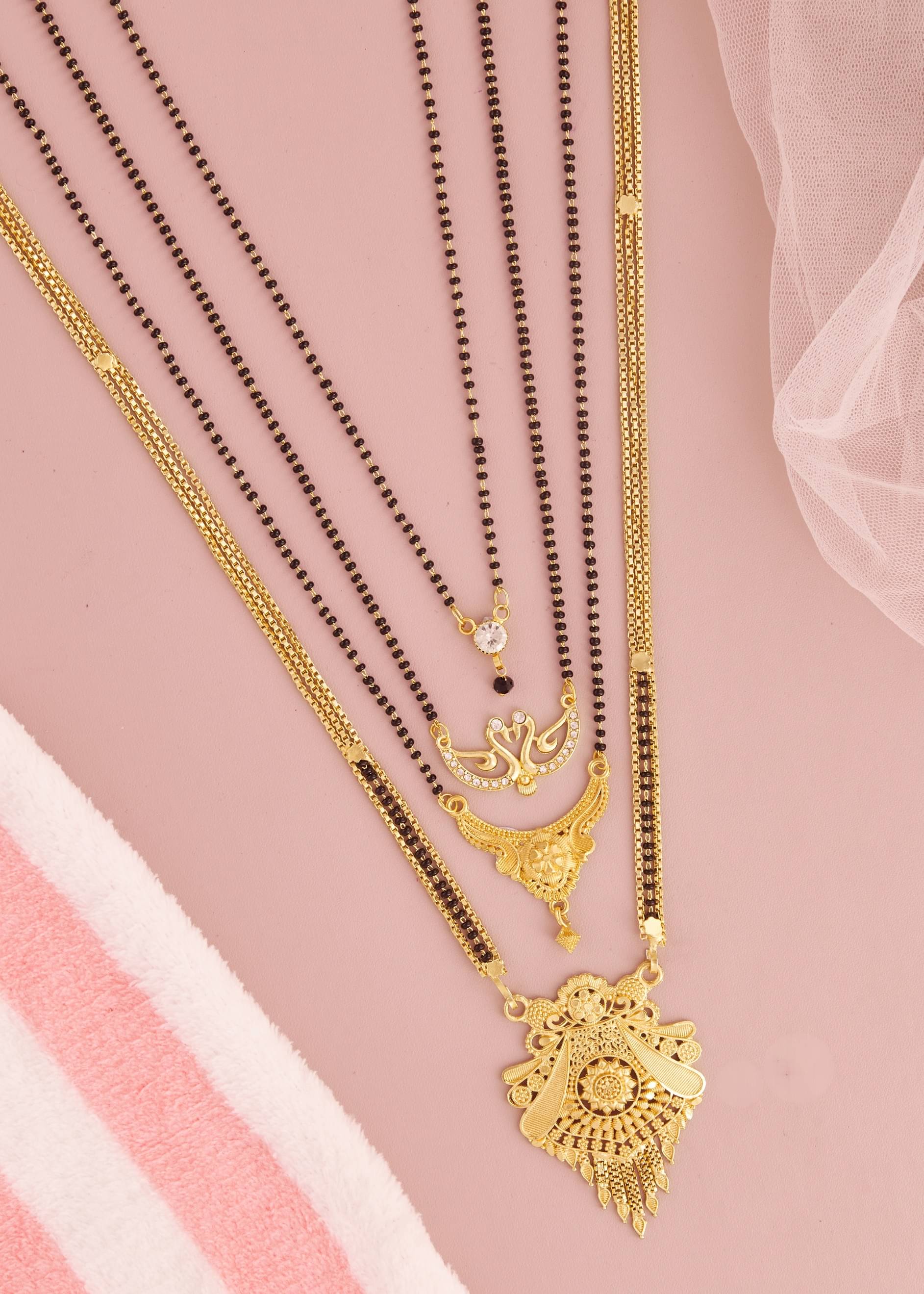 KIEICE Golden Mangalsutra Set ( Pack of 4 ) KIEICE Golden Mangalsutra Set ( Pack of 4 )