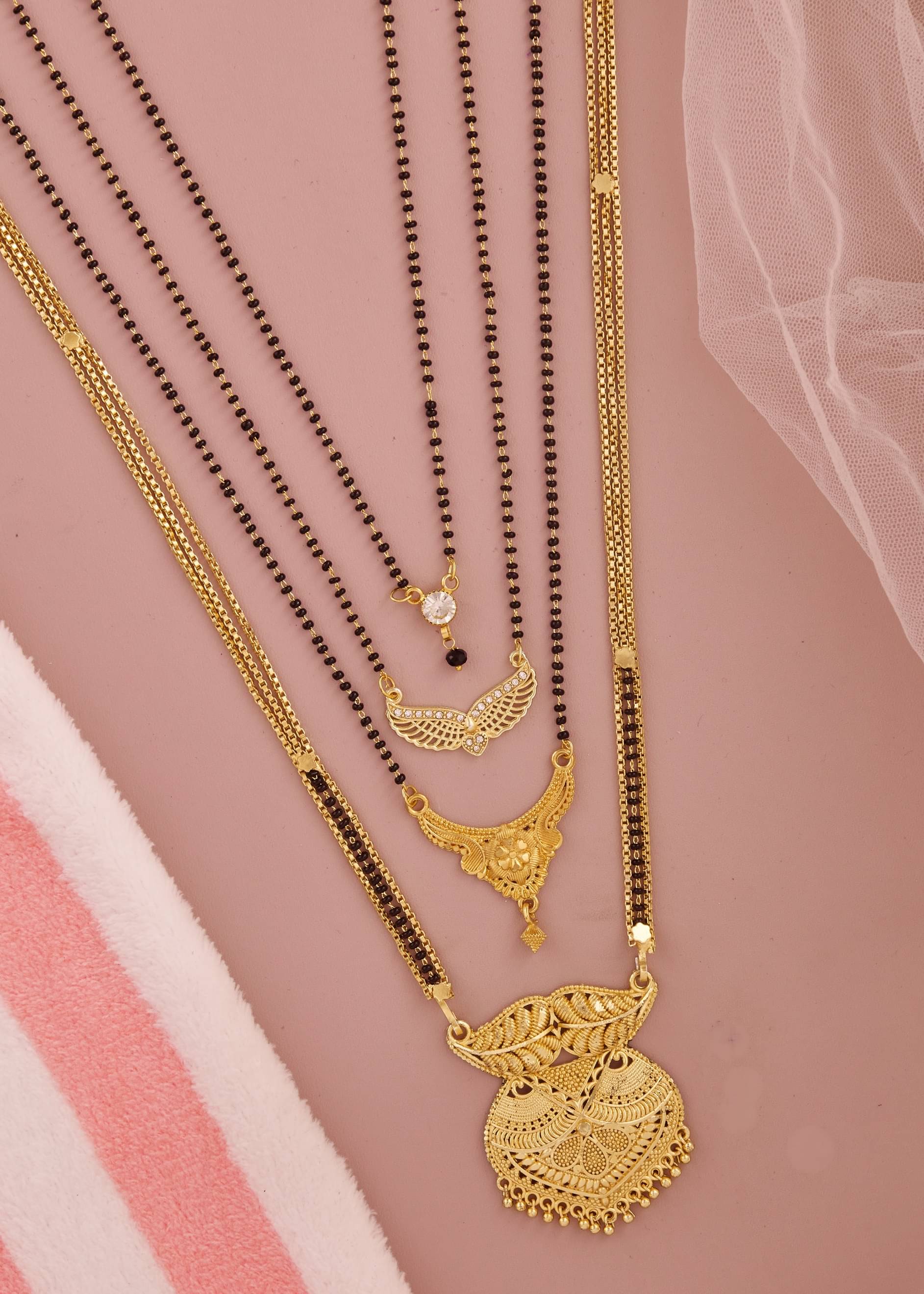 KIEICE Golden Mangalsutra Set ( Pack of 4 ) KIEICE Golden Mangalsutra Set ( Pack of 4 )