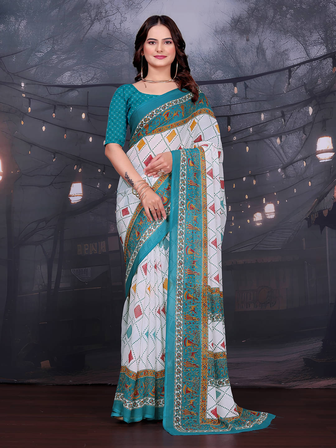     			Kanooda Prints Georgette Printed Regular Saree With Unstitched Blouse Piece ( Blue )