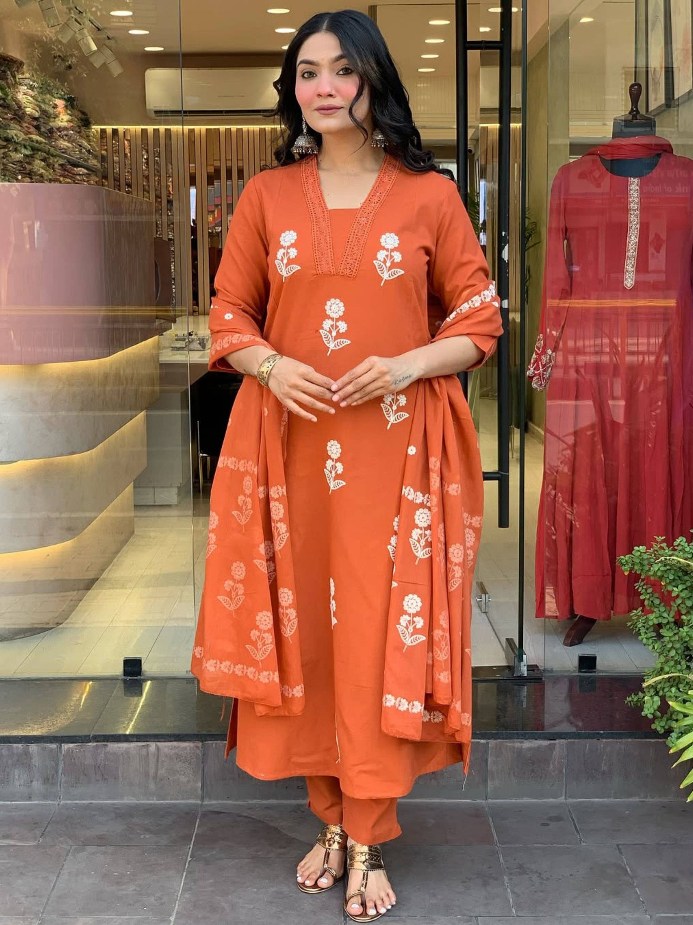     			Eeloo Women Cotton Embroidered Straight Kurti With Pants ( Orange )