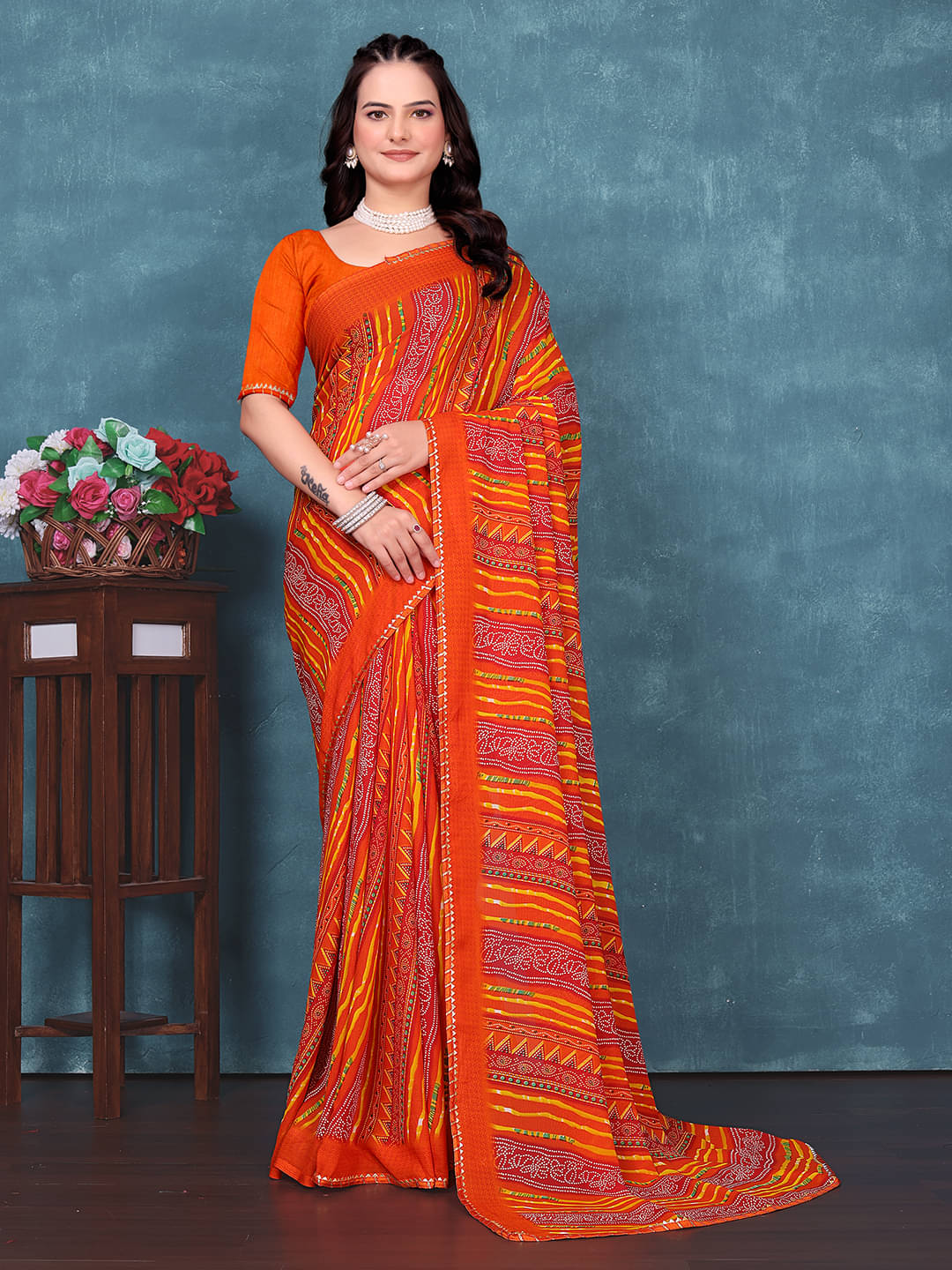     			Kanooda Prints Georgette Printed Regular Saree With Unstitched Blouse Piece ( Rust )