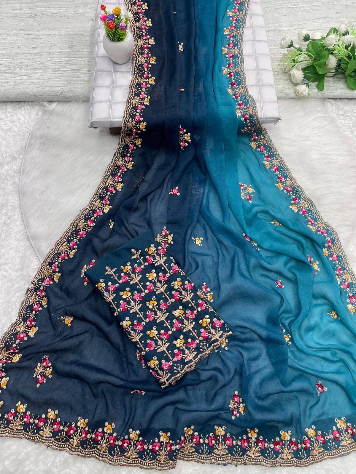 Rangtulika Ethnics Georgette Embroidered Banarasi saree With Unstitched Blouse Piece ( Blue ) Rangtulika Ethnics Georgette Embroidered Banarasi saree With Unstitched Blouse Piece ( Blue )