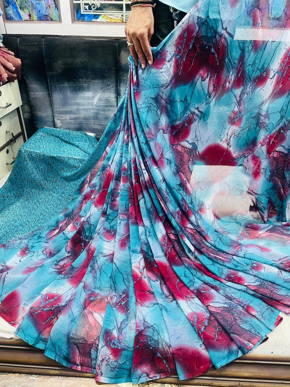 SHIRODHARI Georgette Printed Saree With Unstitched Blouse Piece ( Light Blue ) SHIRODHARI Georgette Printed Saree With Unstitched Blouse Piece ( Light Blue )