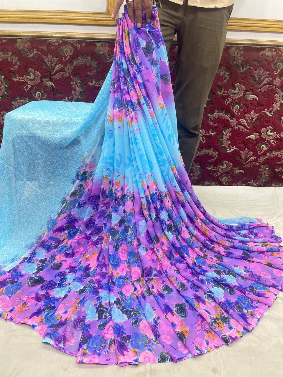     			SHIRODHARI Georgette Printed Saree With Unstitched Blouse Piece ( Light Blue )