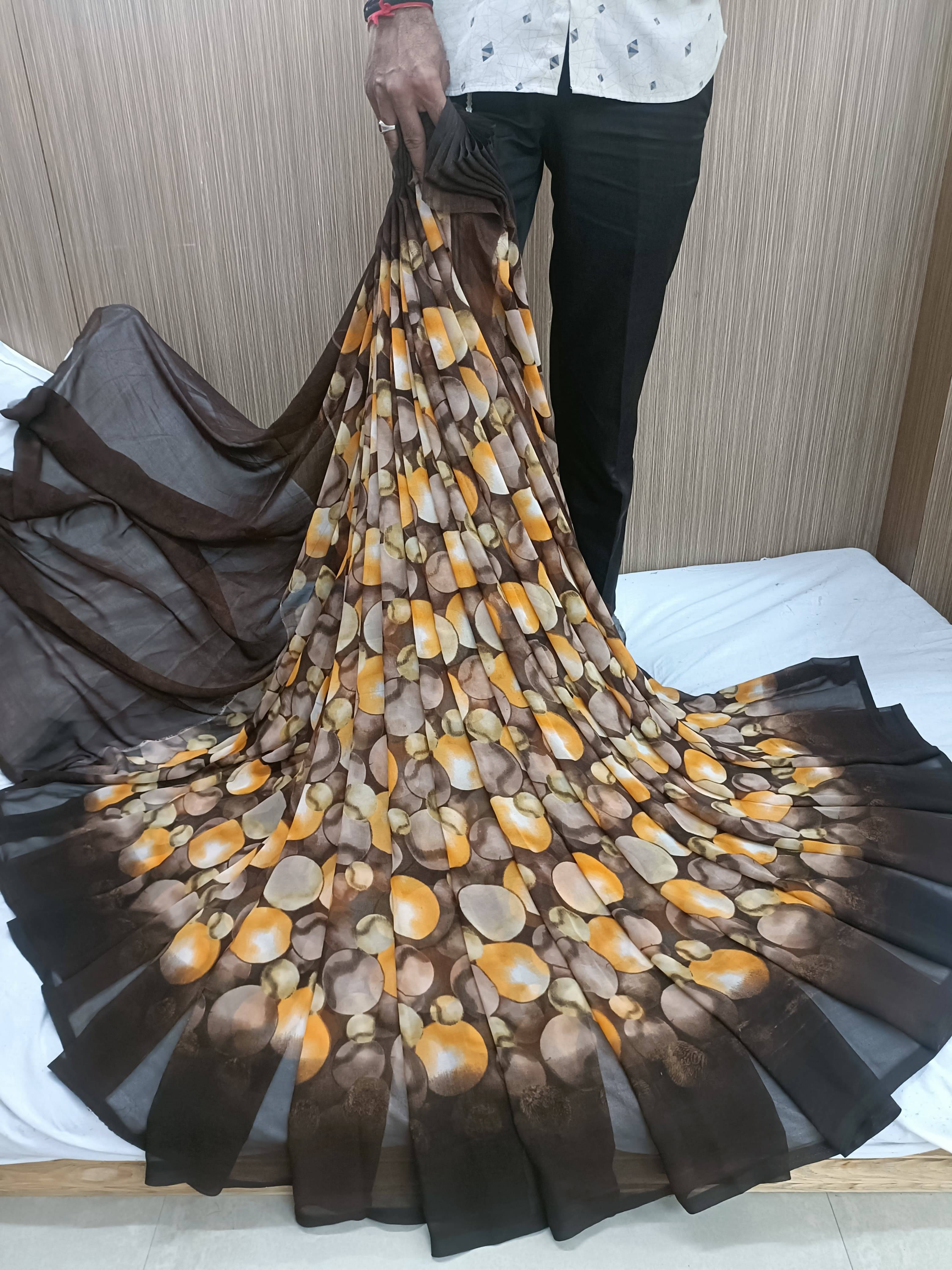 SHIRODHARI Georgette Printed Saree With Unstitched Blouse Piece ( Brown ) SHIRODHARI Georgette Printed Saree With Unstitched Blouse Piece ( Brown )