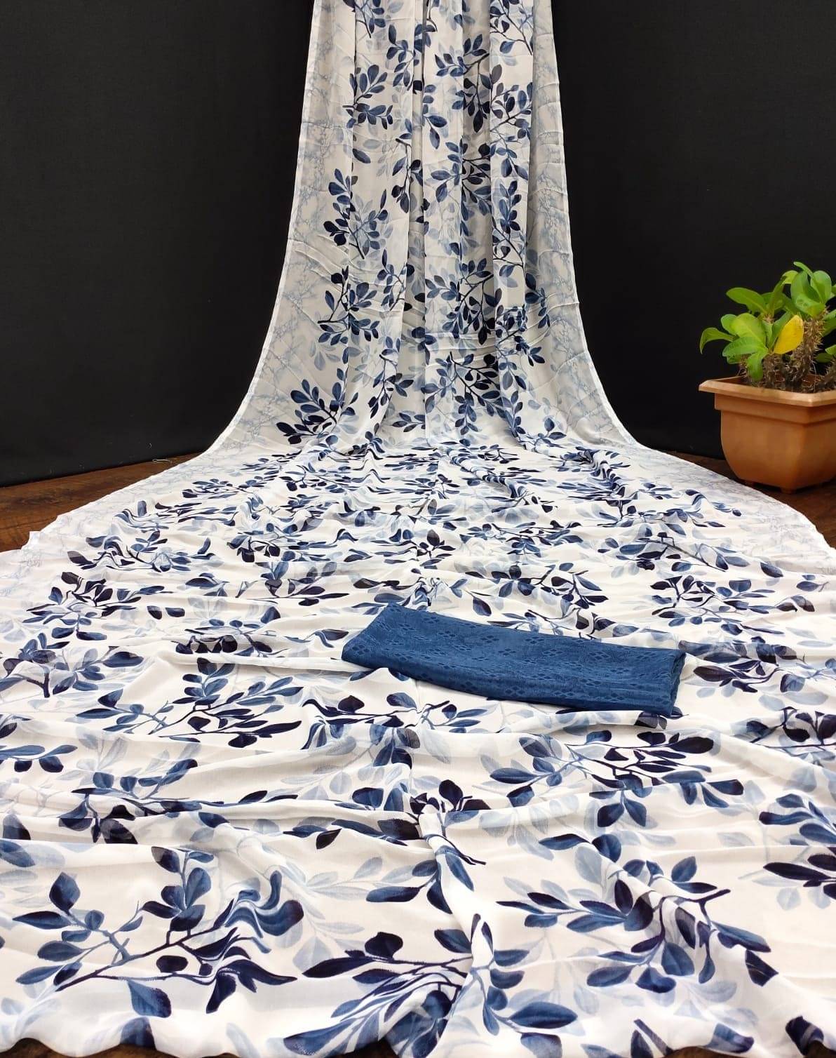 SHIRODHARI Georgette Printed Saree With Unstitched Blouse Piece ( Blue ) SHIRODHARI Georgette Printed Saree With Unstitched Blouse Piece ( Blue )