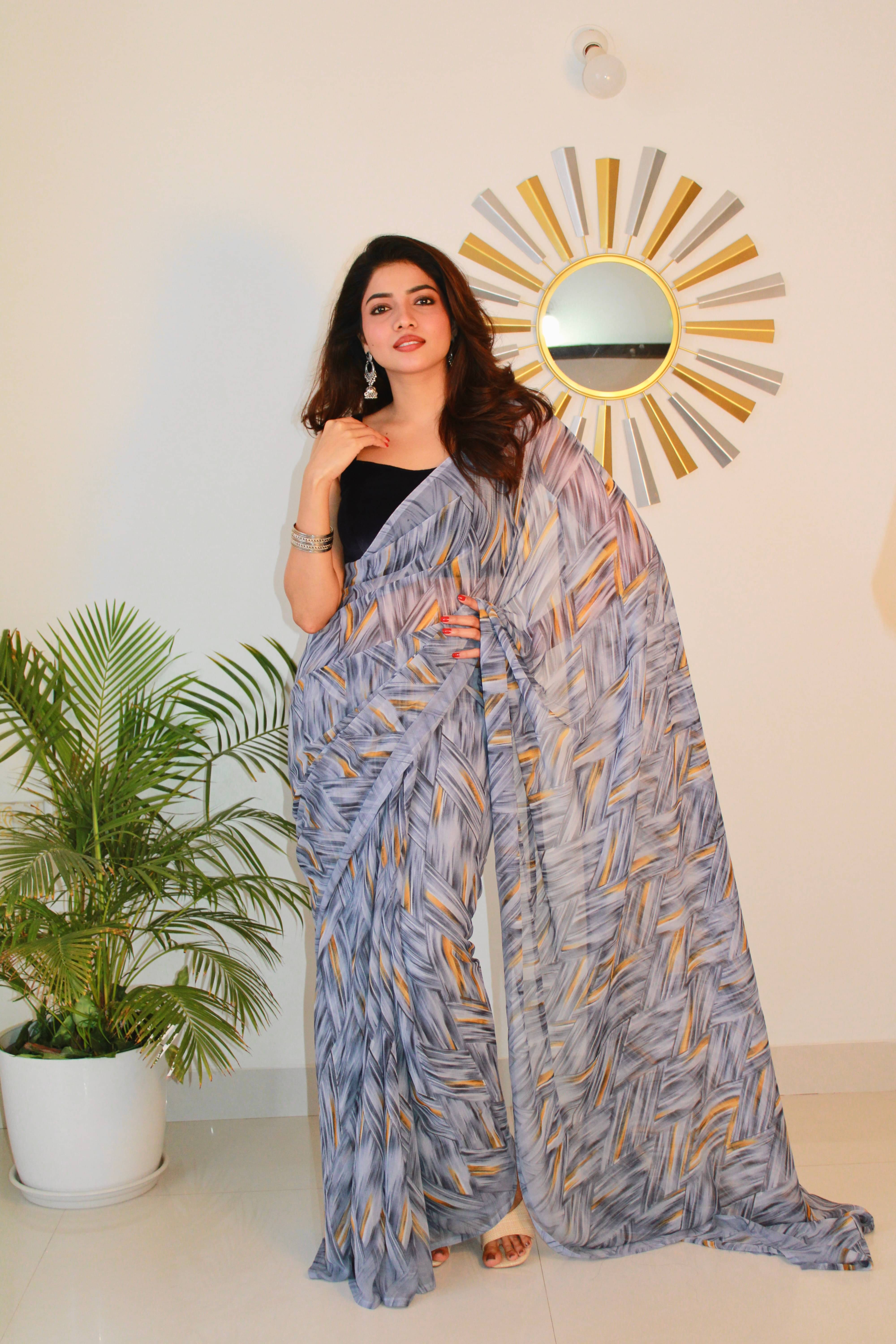 SHIRODHARI Georgette Printed Saree With Unstitched Blouse Piece ( Grey ) SHIRODHARI Georgette Printed Saree With Unstitched Blouse Piece ( Grey )