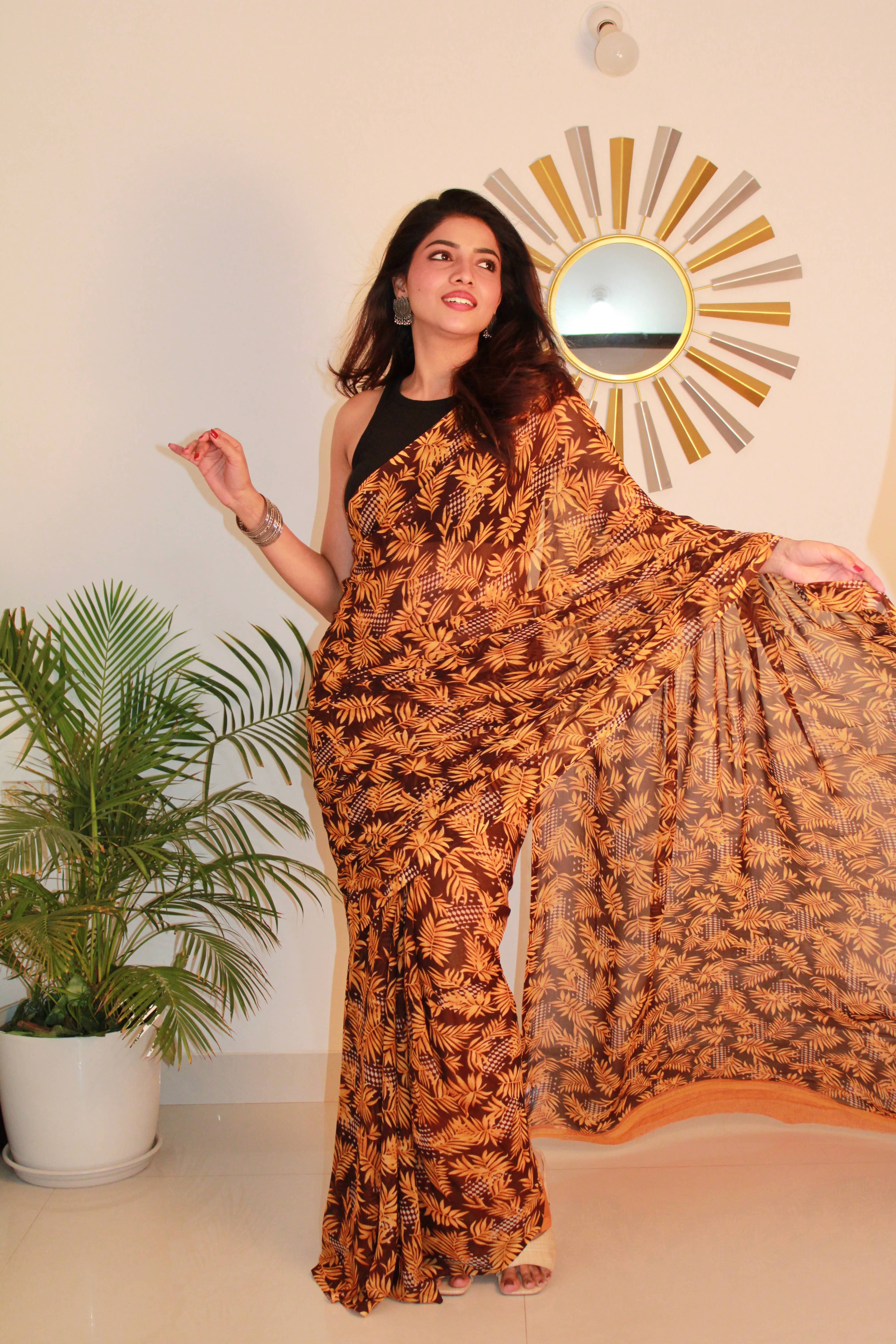     			SHIRODHARI Georgette Printed Saree With Unstitched Blouse Piece ( Yellow )