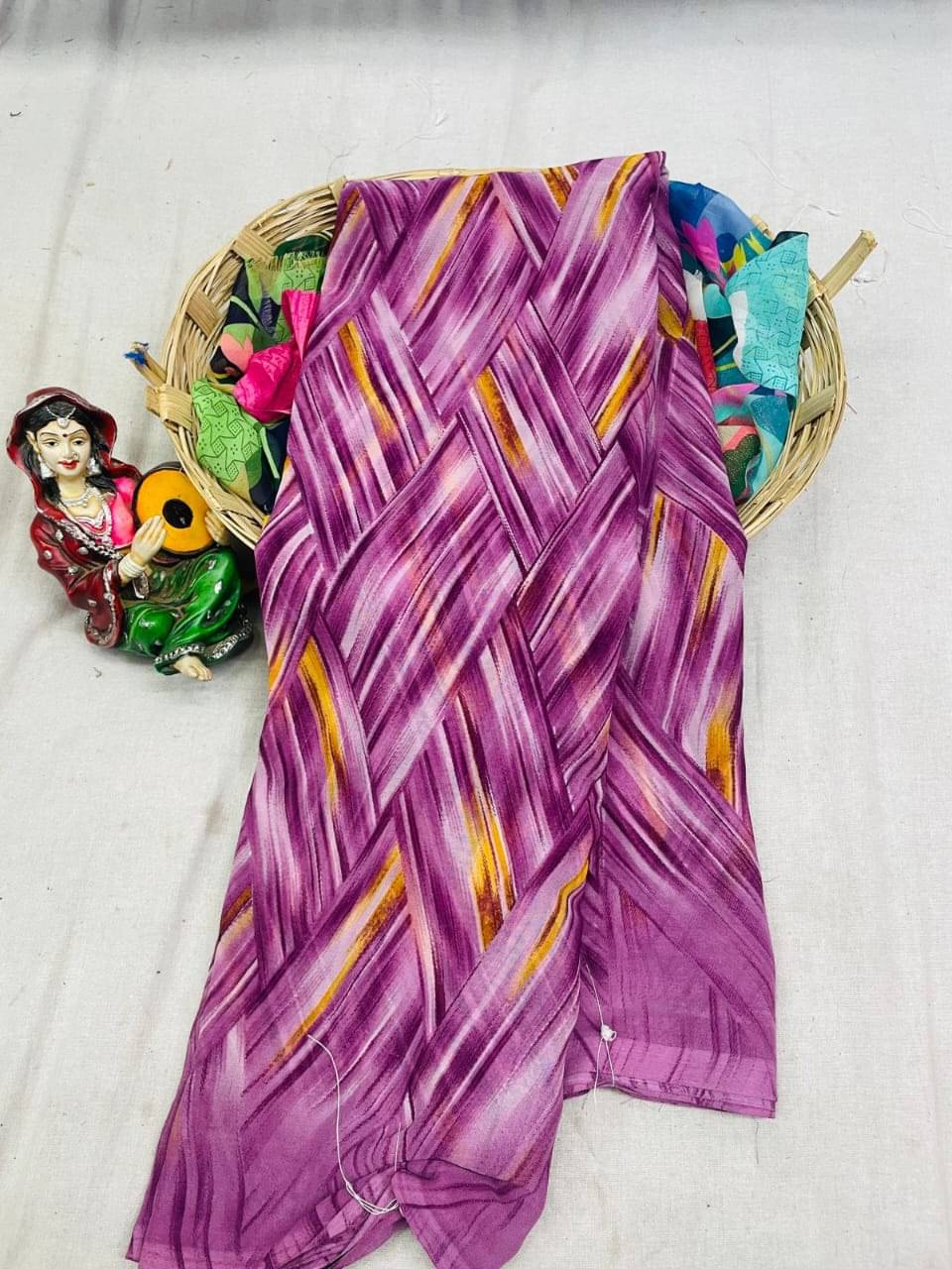 SHIRODHARI Georgette Printed Saree With Unstitched Blouse Piece ( Purple ) SHIRODHARI Georgette Printed Saree With Unstitched Blouse Piece ( Purple )