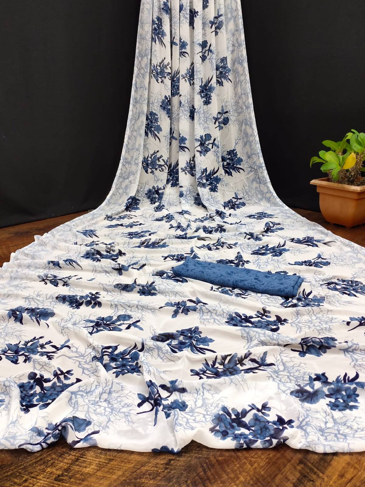 SHIRODHARI Georgette Printed Saree With Unstitched Blouse Piece ( Blue ) SHIRODHARI Georgette Printed Saree With Unstitched Blouse Piece ( Blue )