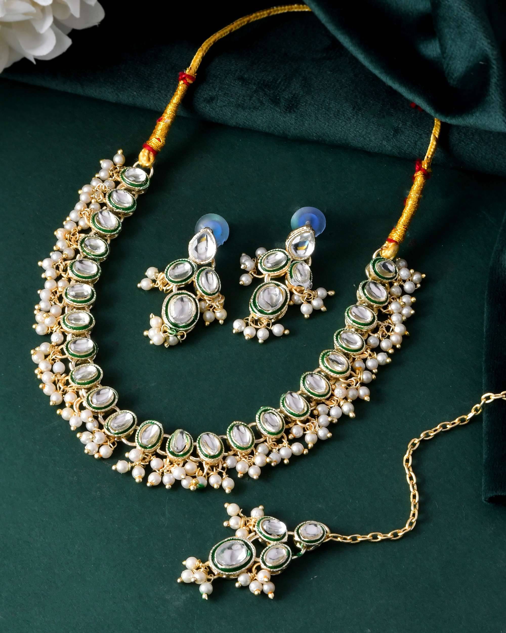     			Jewels Nest Gold Alloy Necklace Set ( Pack of 1 )