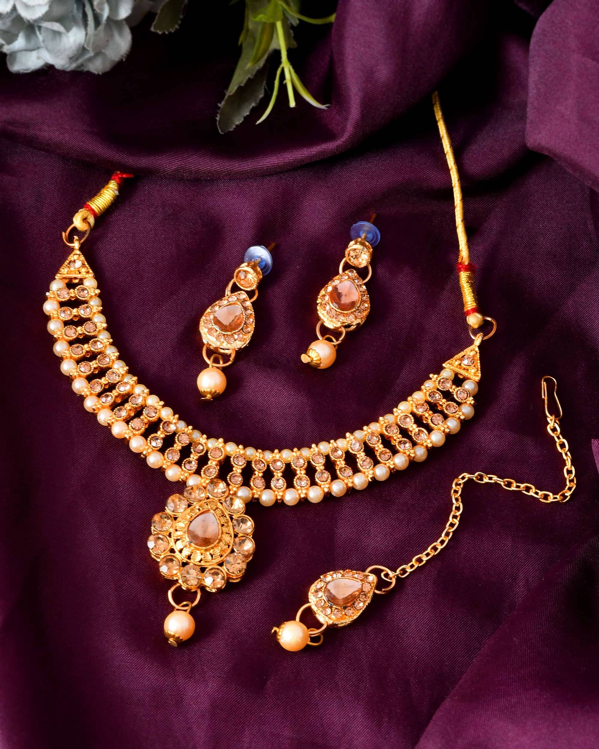     			Jewels Nest Gold Alloy Necklace Set ( Pack of 1 )