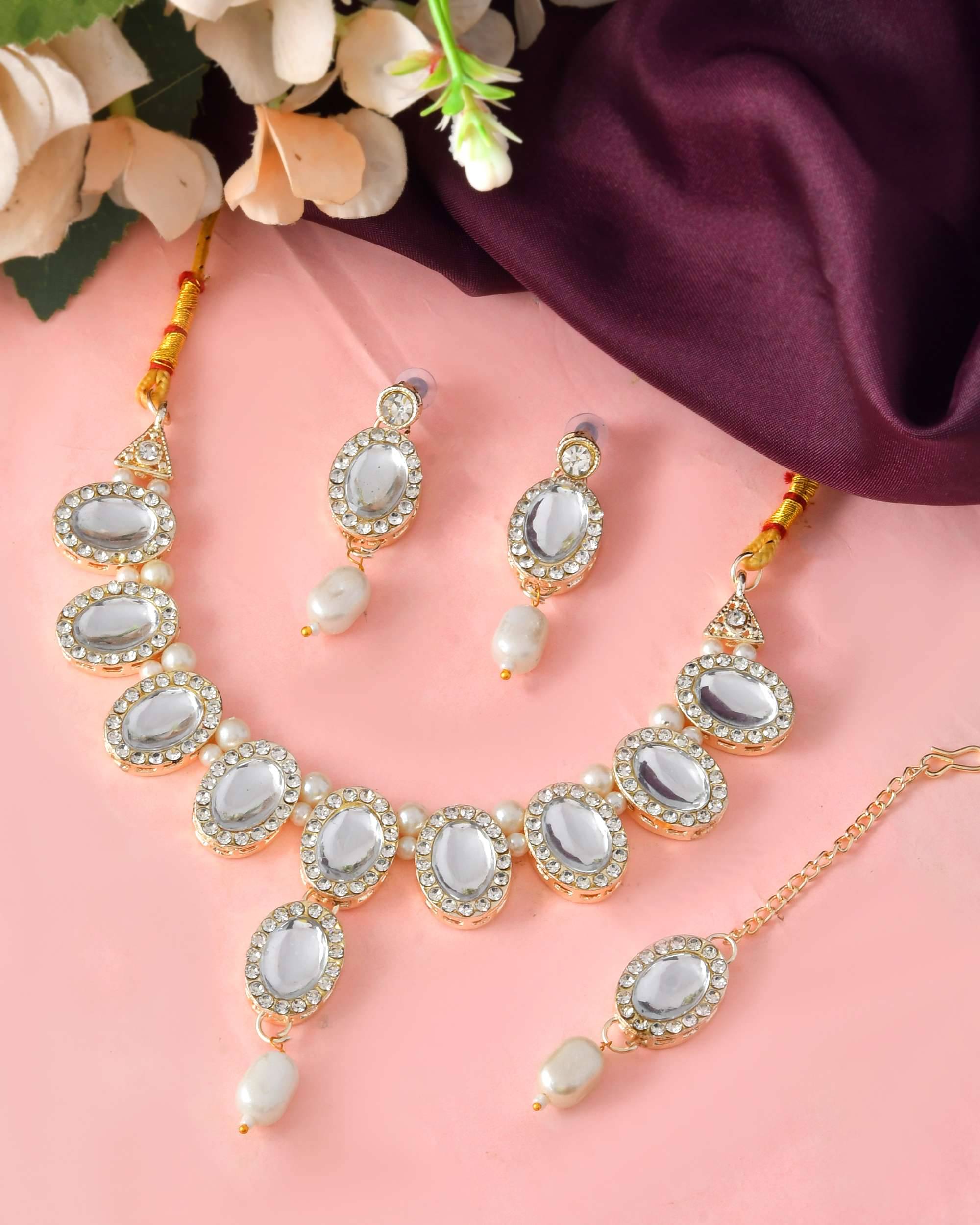     			Jewels Nest Gold Stainless Steel Necklace Set ( Pack of 1 )