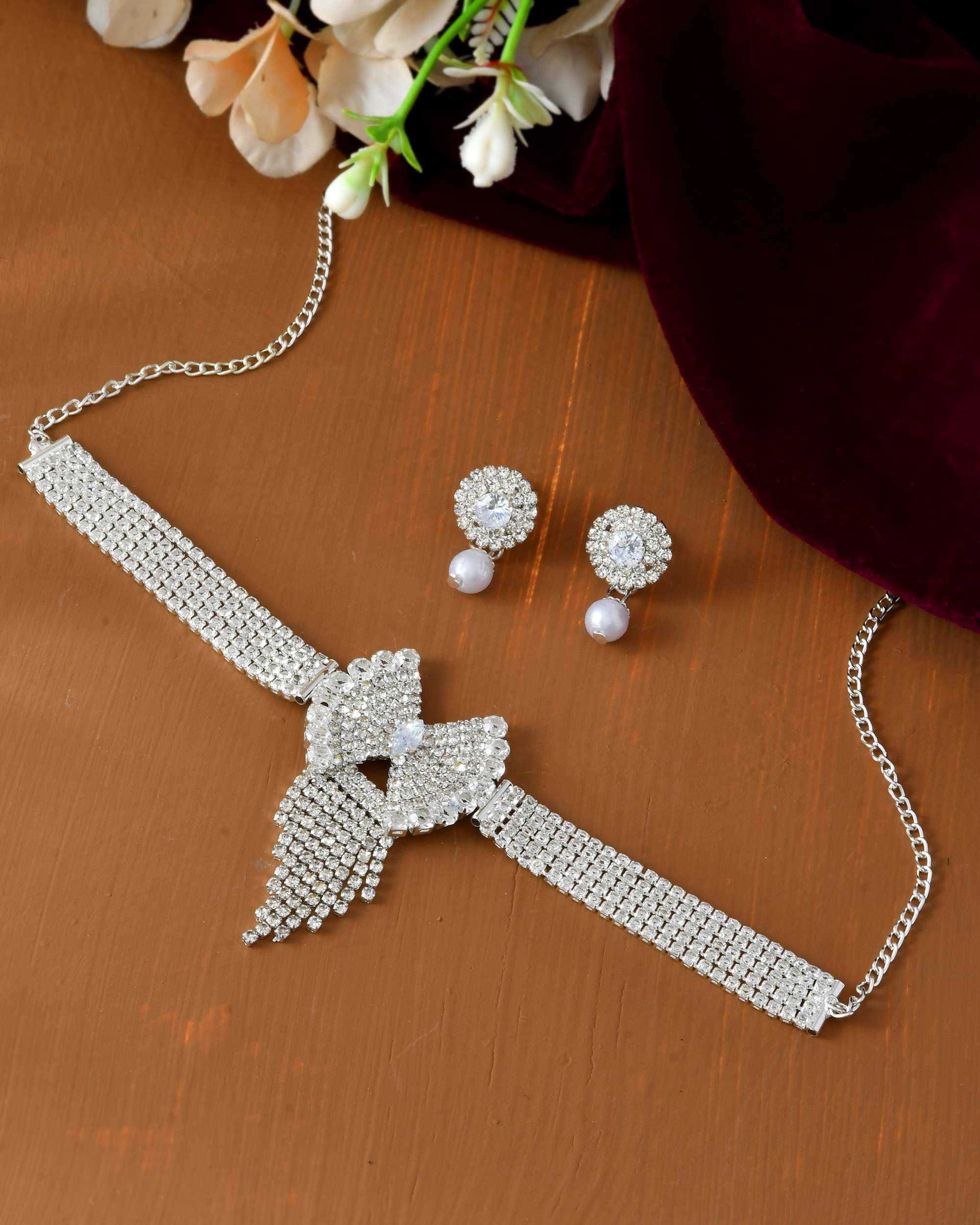     			Jewels Nest Silver Stainless Steel Necklace Set ( Pack of 1 )