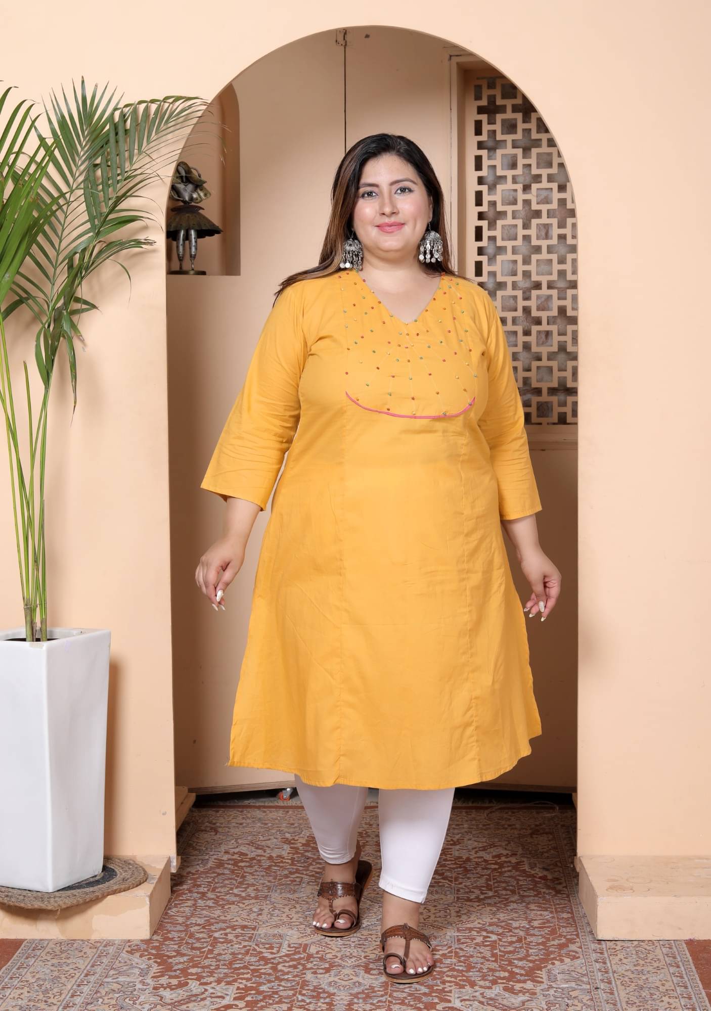     			Tankirti Women Cotton Solid Straight Kurti ( Yellow )