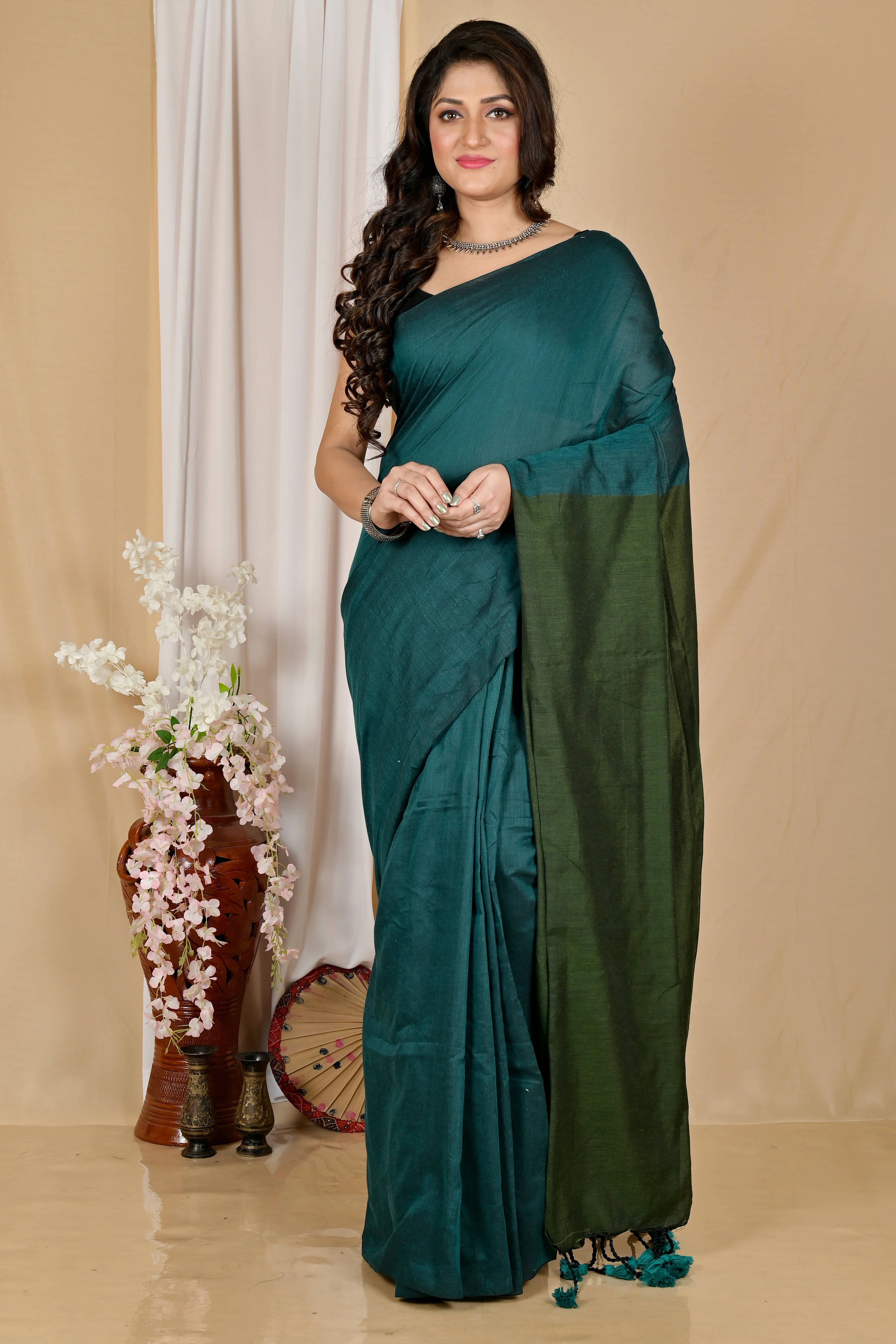 BRYNBRIT Cotton Self Design Tant Saree With Unstitched Blouse Piece ( Teal ) BRYNBRIT Cotton Self Design Tant Saree With Unstitched Blouse Piece ( Teal )