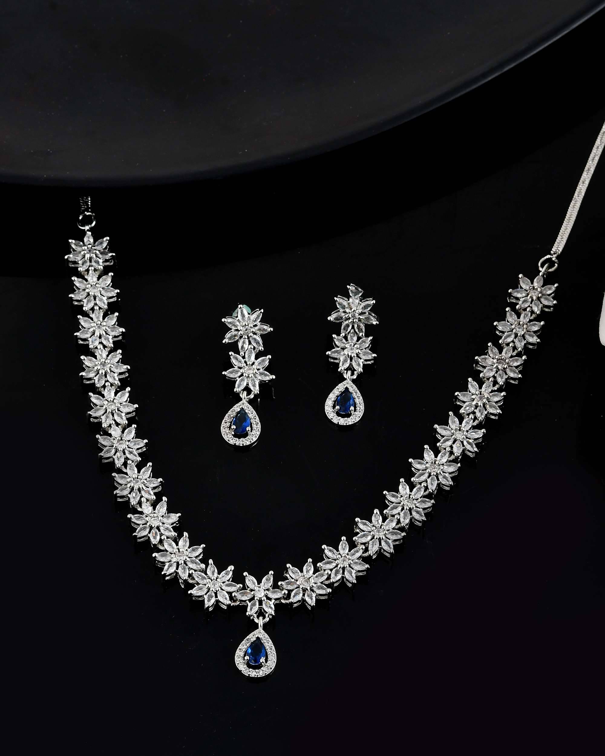     			Jewels Nest Blue Stainless Steel Necklace Set ( Pack of 1 )