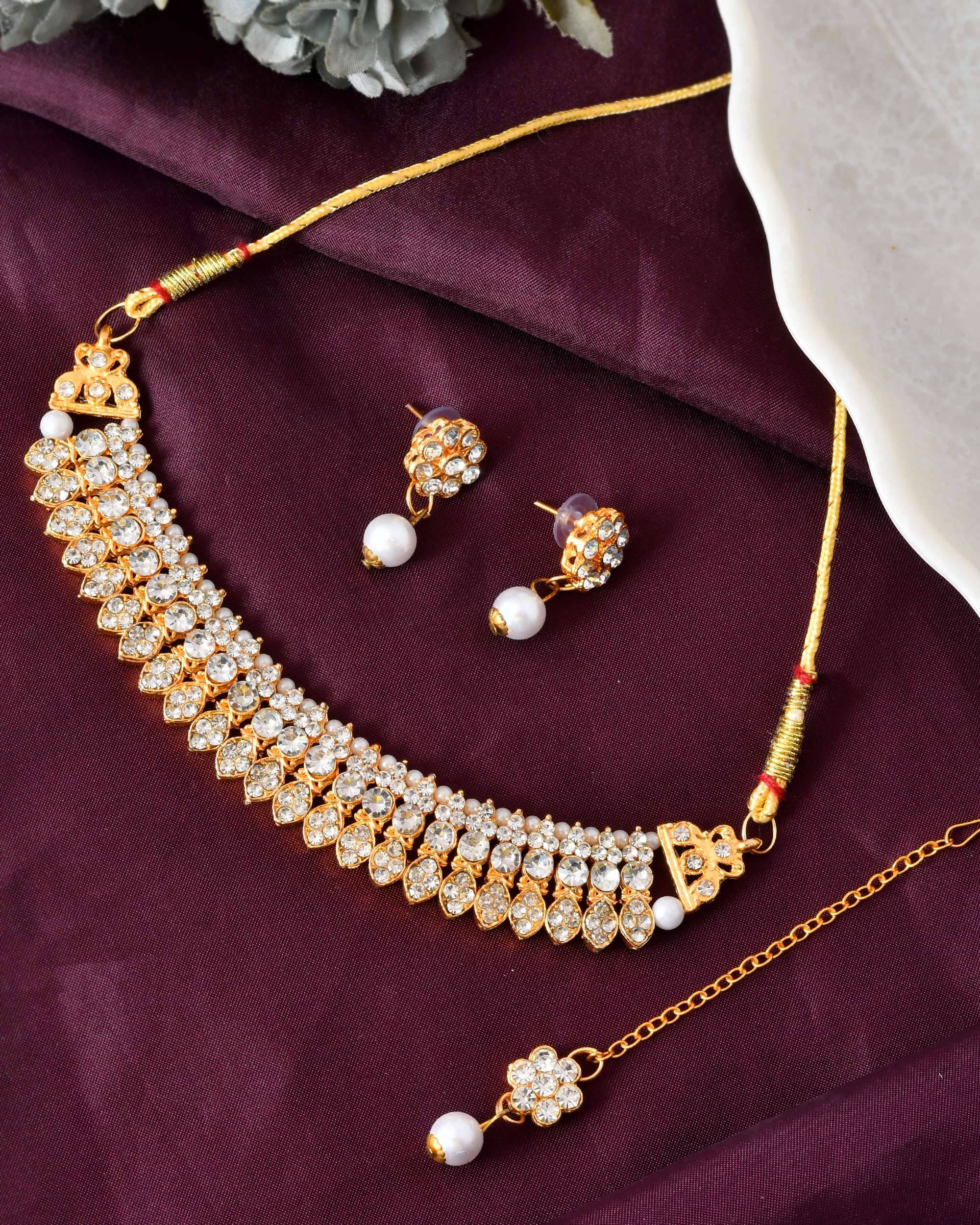     			Jewels Nest Gold Stainless Steel Necklace Set ( Pack of 1 )