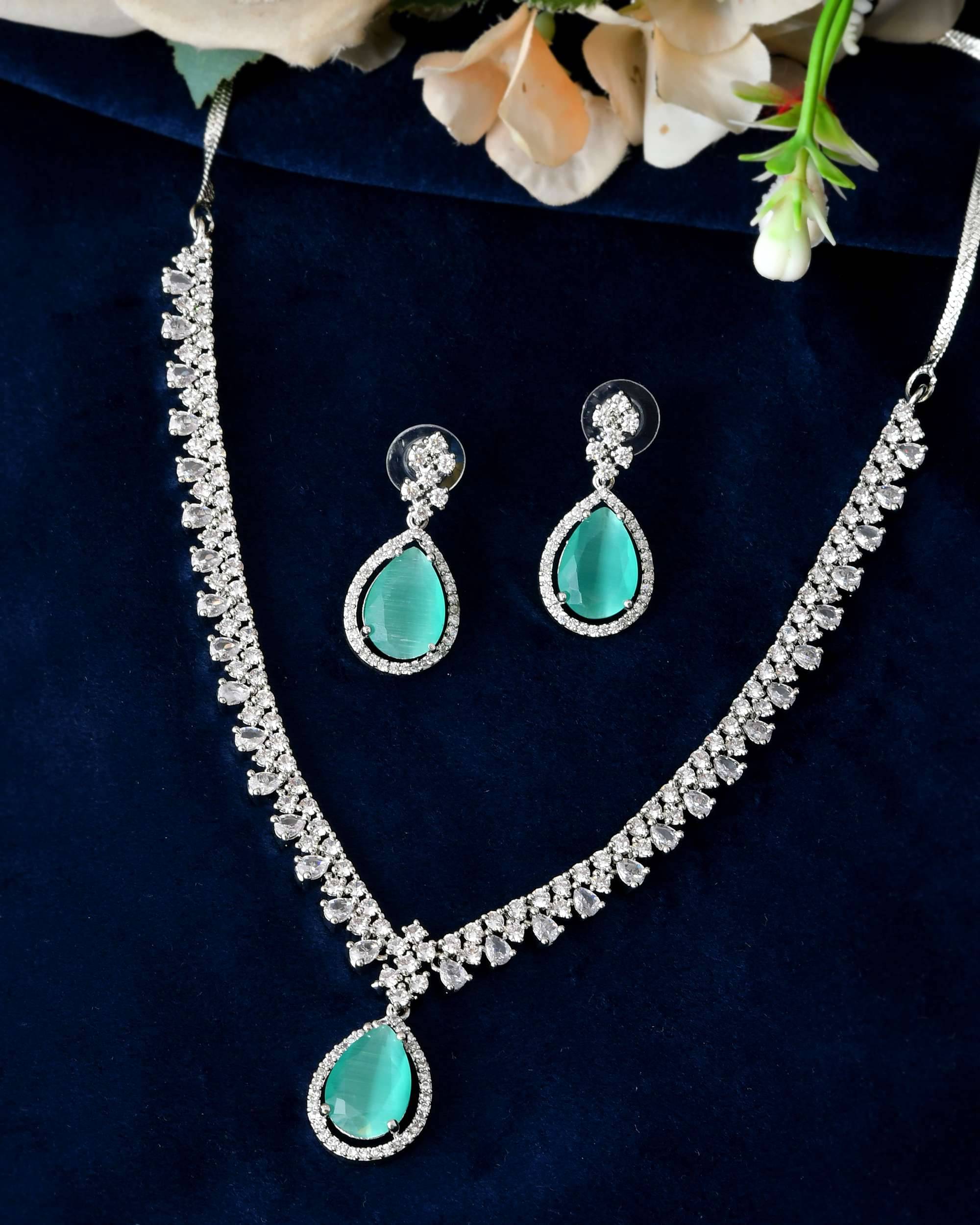     			Jewels Nest Teal Stainless Steel Necklace Set ( Pack of 1 )