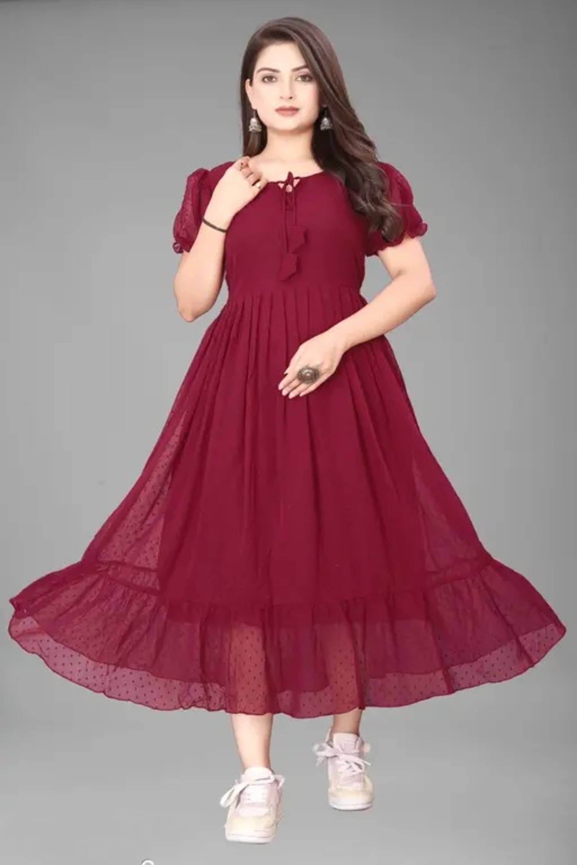 Nilkanthvarni Creation Women Georgette Self Design Gown ( Maroon ) Nilkanthvarni Creation Women Georgette Self Design Gown ( Maroon )