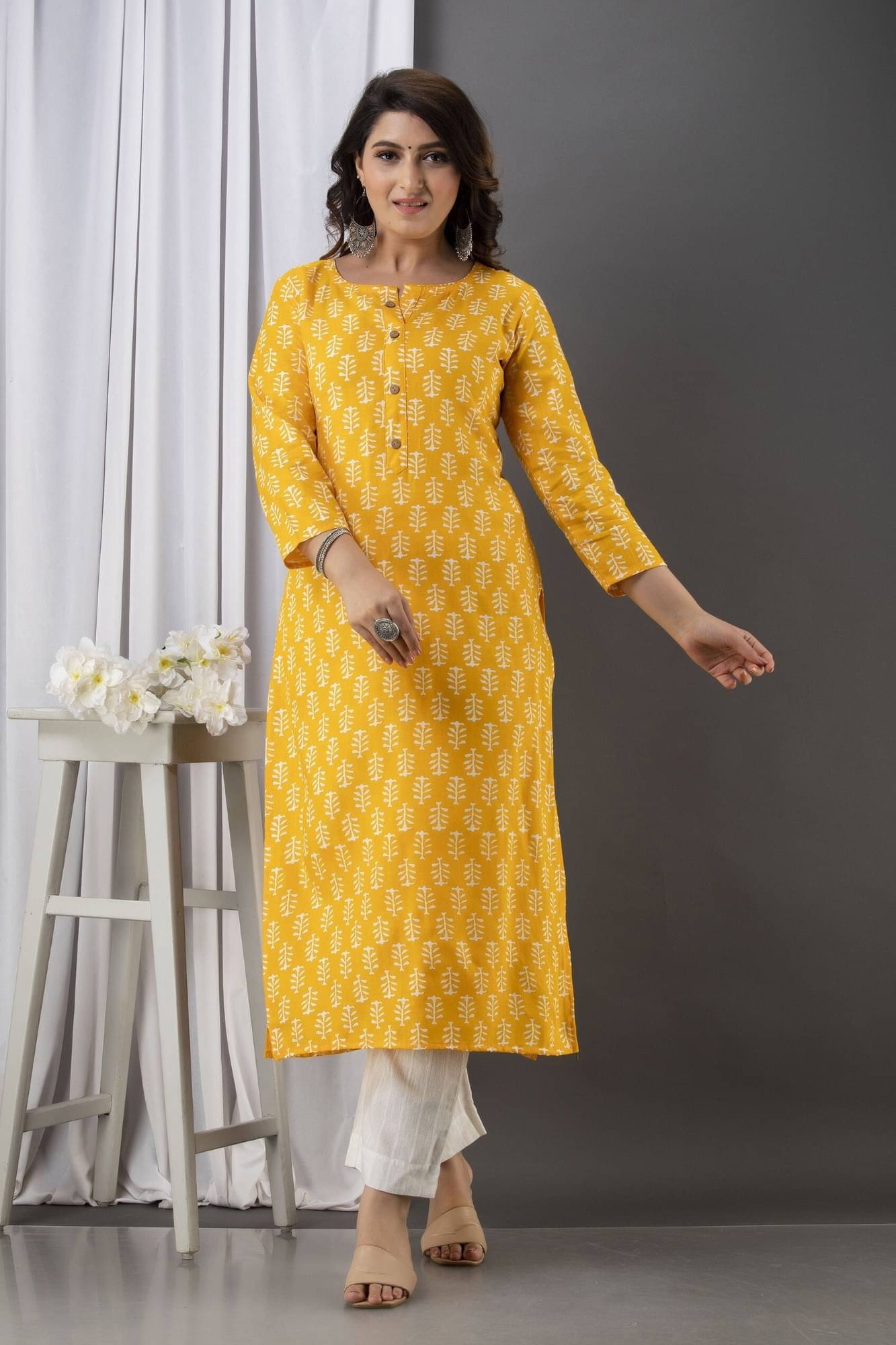 Vicitra Women Viscose Rayon Printed Straight Kurti ( Yellow ) Vicitra Women Viscose Rayon Printed Straight Kurti ( Yellow )