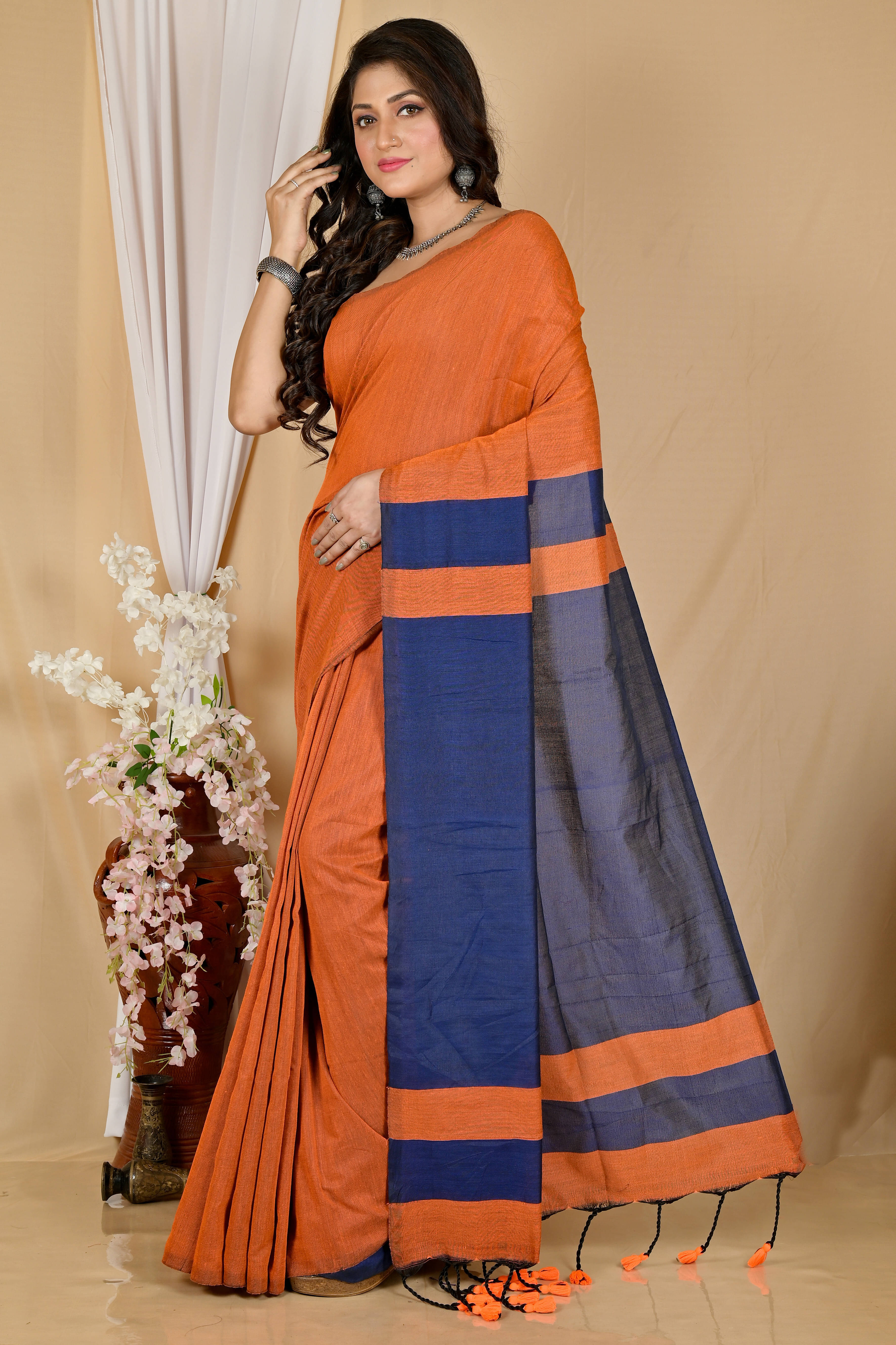 Zayraa Cotton Self Design Tant Saree With Unstitched Blouse Piece ( Orange ) Zayraa Cotton Self Design Tant Saree With Unstitched Blouse Piece ( Orange )