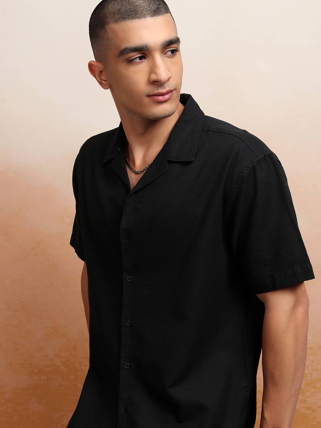 Highlander 100% Cotton Relaxed Fit Self Design Half Sleeves Men's Casual Shirt - Black ( Pack of 1 )     			Highlander 100% Cotton Relaxed Fit Self Design Half Sleeves Men's Casual Shirt - Black ( Pack of 1 )