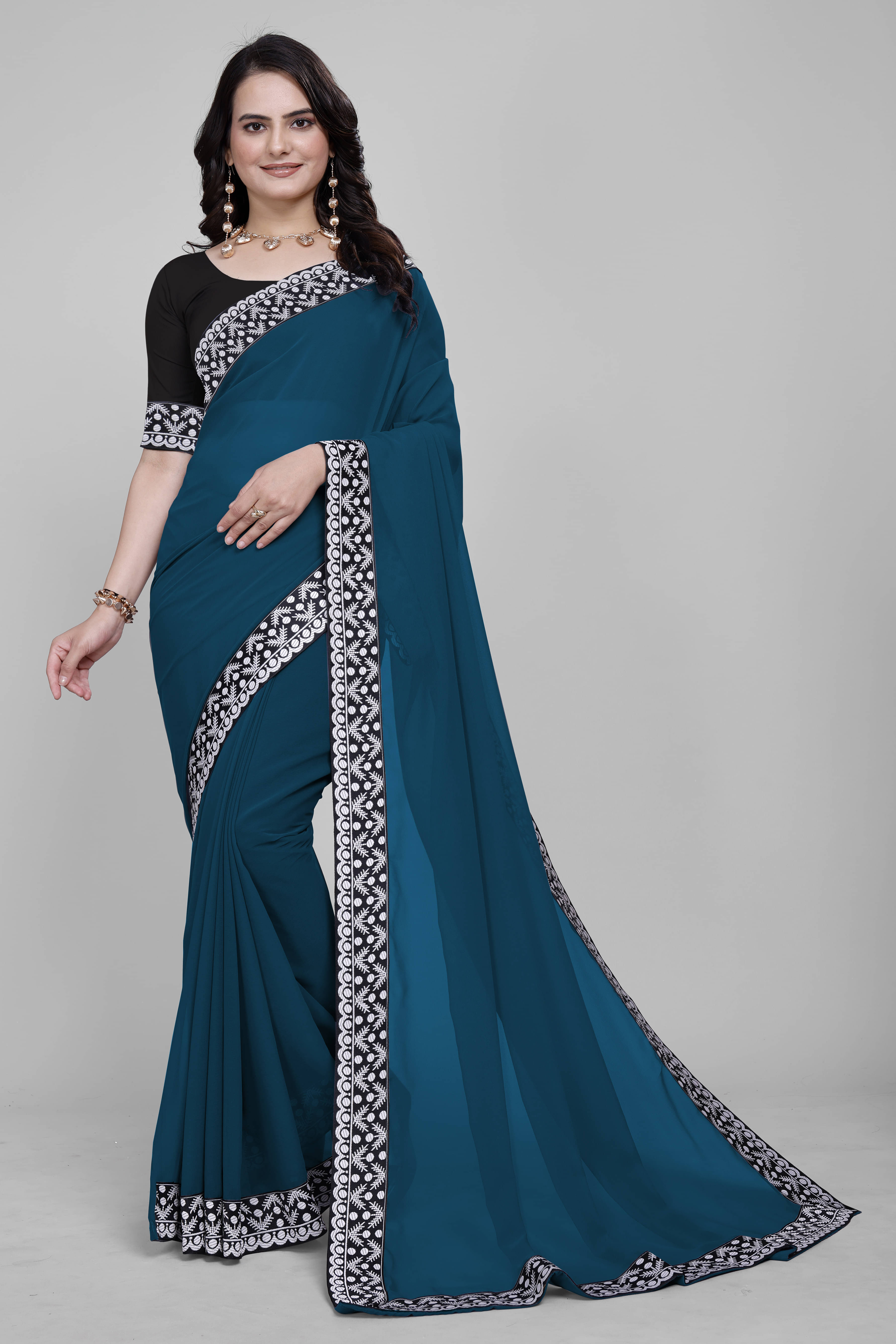 Aai Shree Khodiyar Georgette Self Design Saree With Unstitched Blouse Piece ( Light Blue ) Aai Shree Khodiyar Georgette Self Design Saree With Unstitched Blouse Piece ( Light Blue )