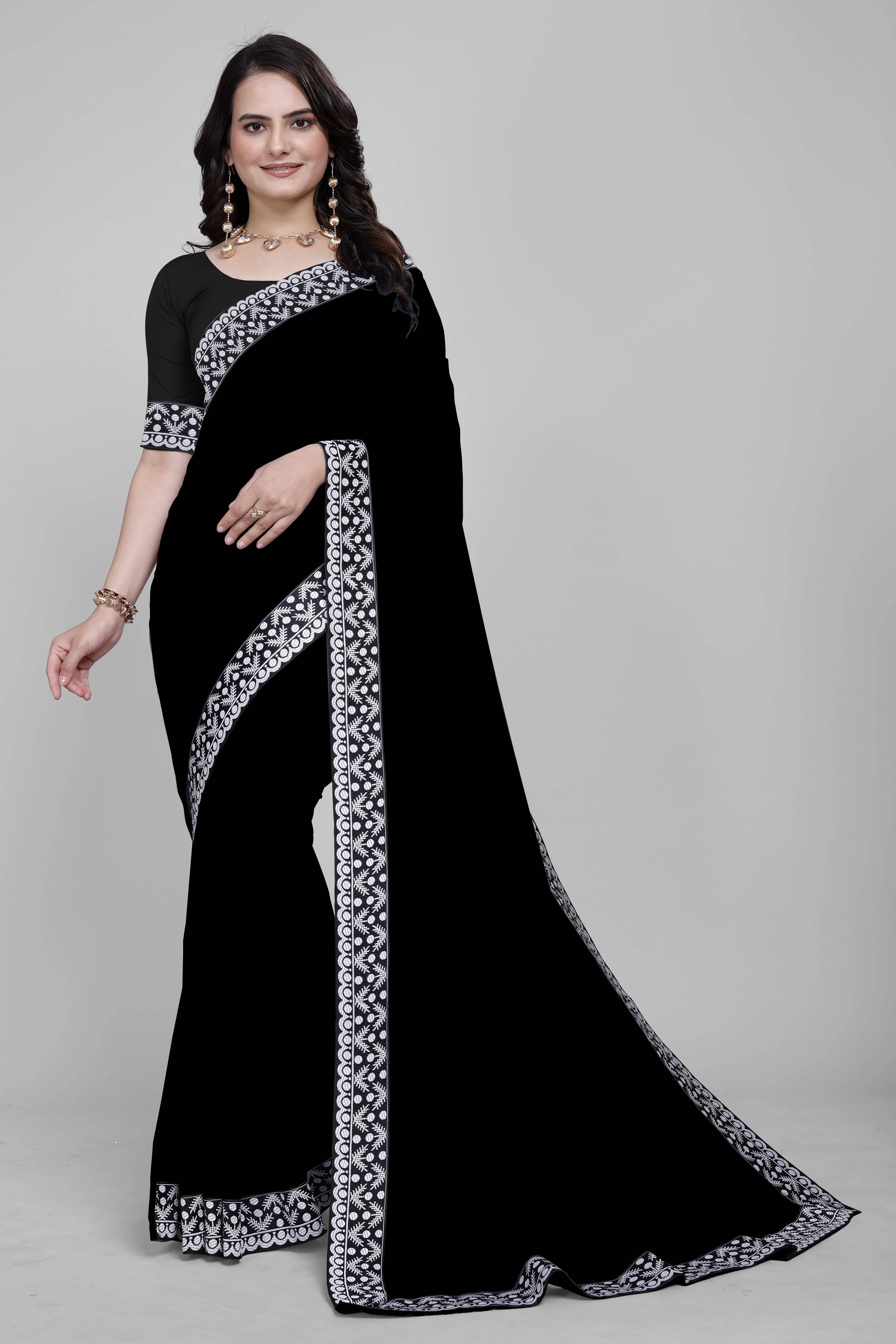 Aai Shree Khodiyar Georgette Self Design Saree With Unstitched Blouse Piece ( Black )     			Aai Shree Khodiyar Georgette Self Design Saree With Unstitched Blouse Piece ( Black )