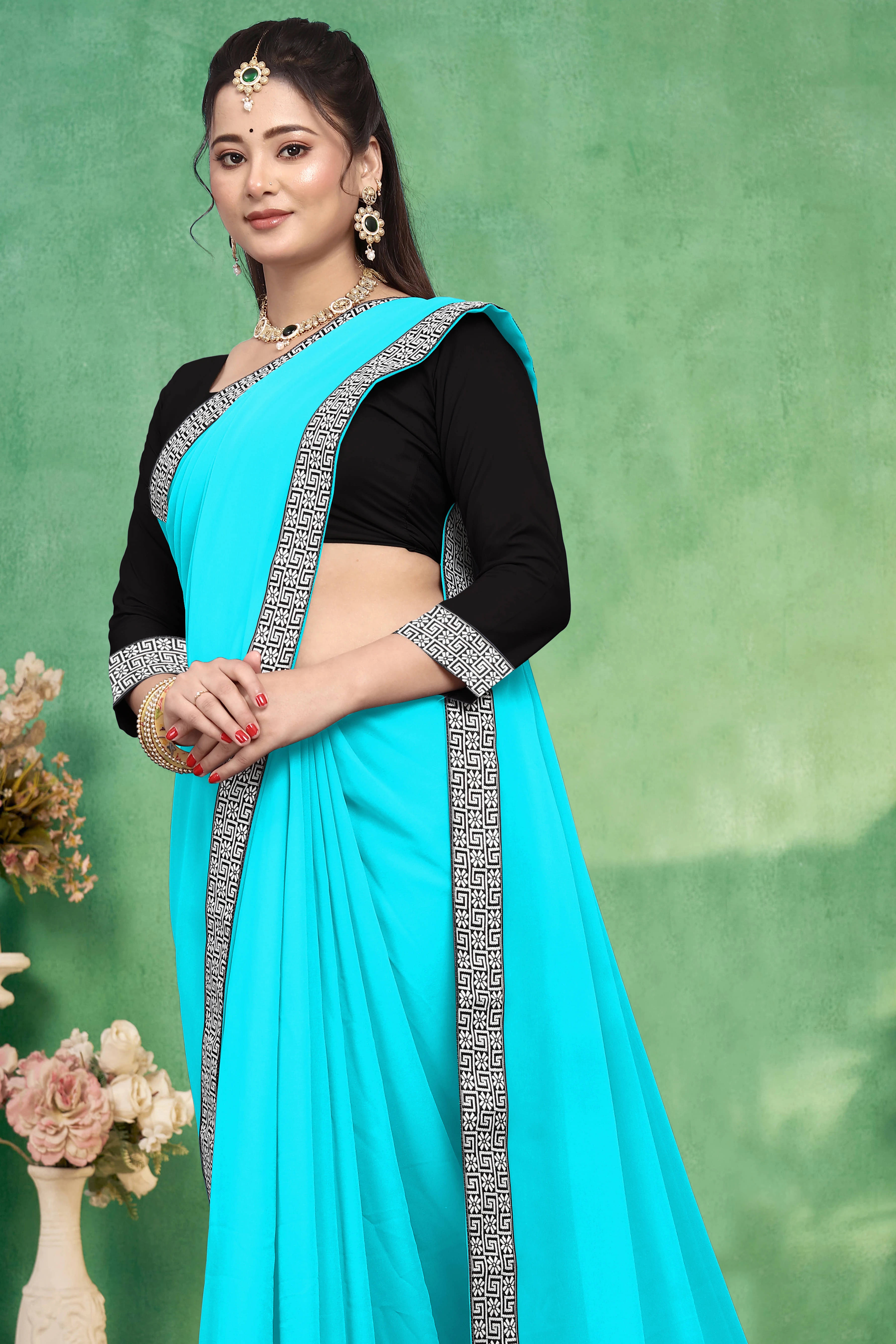 Aai Shree Khodiyar Georgette Self Design Saree With Unstitched Blouse Piece ( Light Blue )     			Aai Shree Khodiyar Georgette Self Design Saree With Unstitched Blouse Piece ( Light Blue )