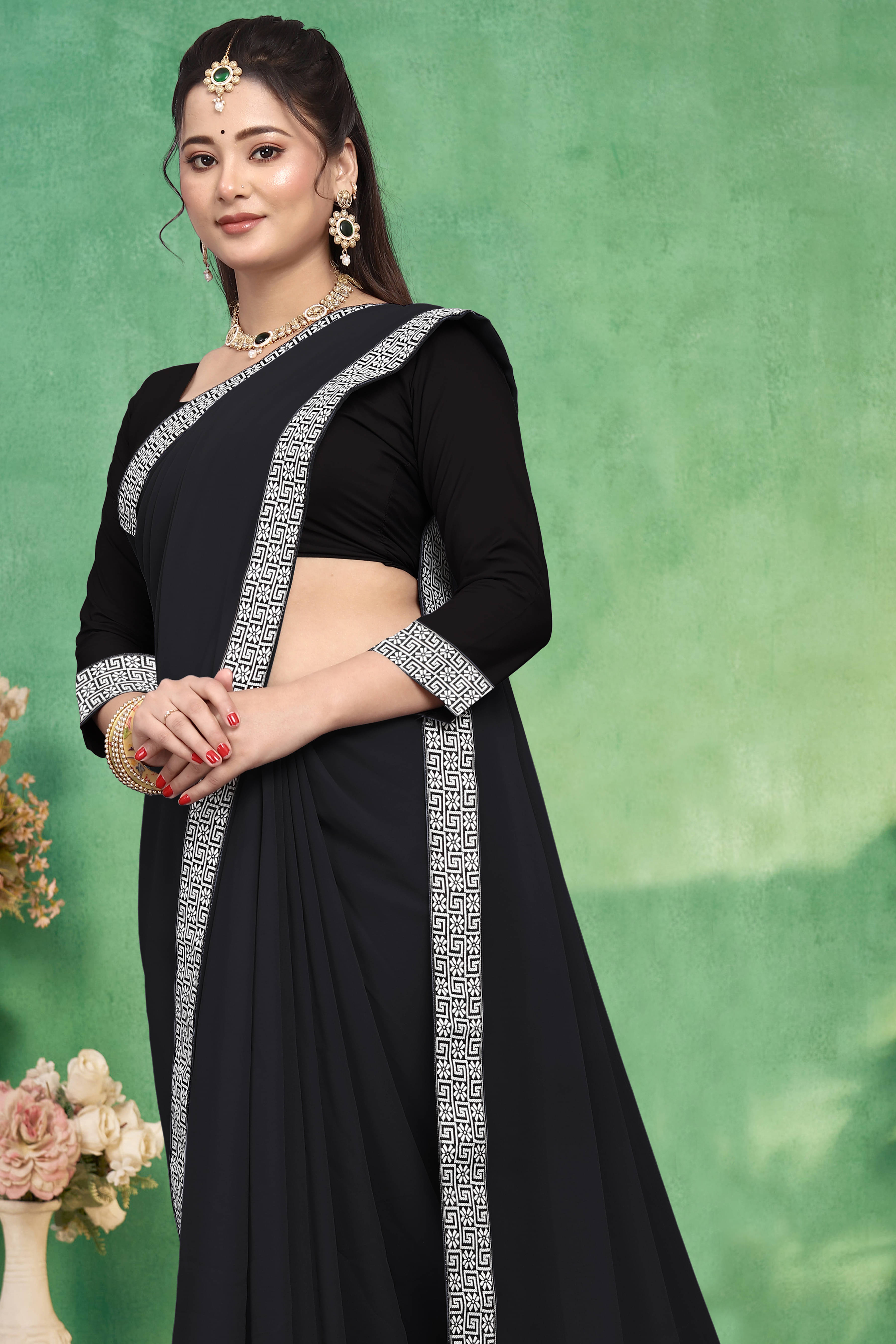 Aai Shree Khodiyar Georgette Solid Saree With Unstitched Blouse Piece ( Black ) Aai Shree Khodiyar Georgette Solid Saree With Unstitched Blouse Piece ( Black )