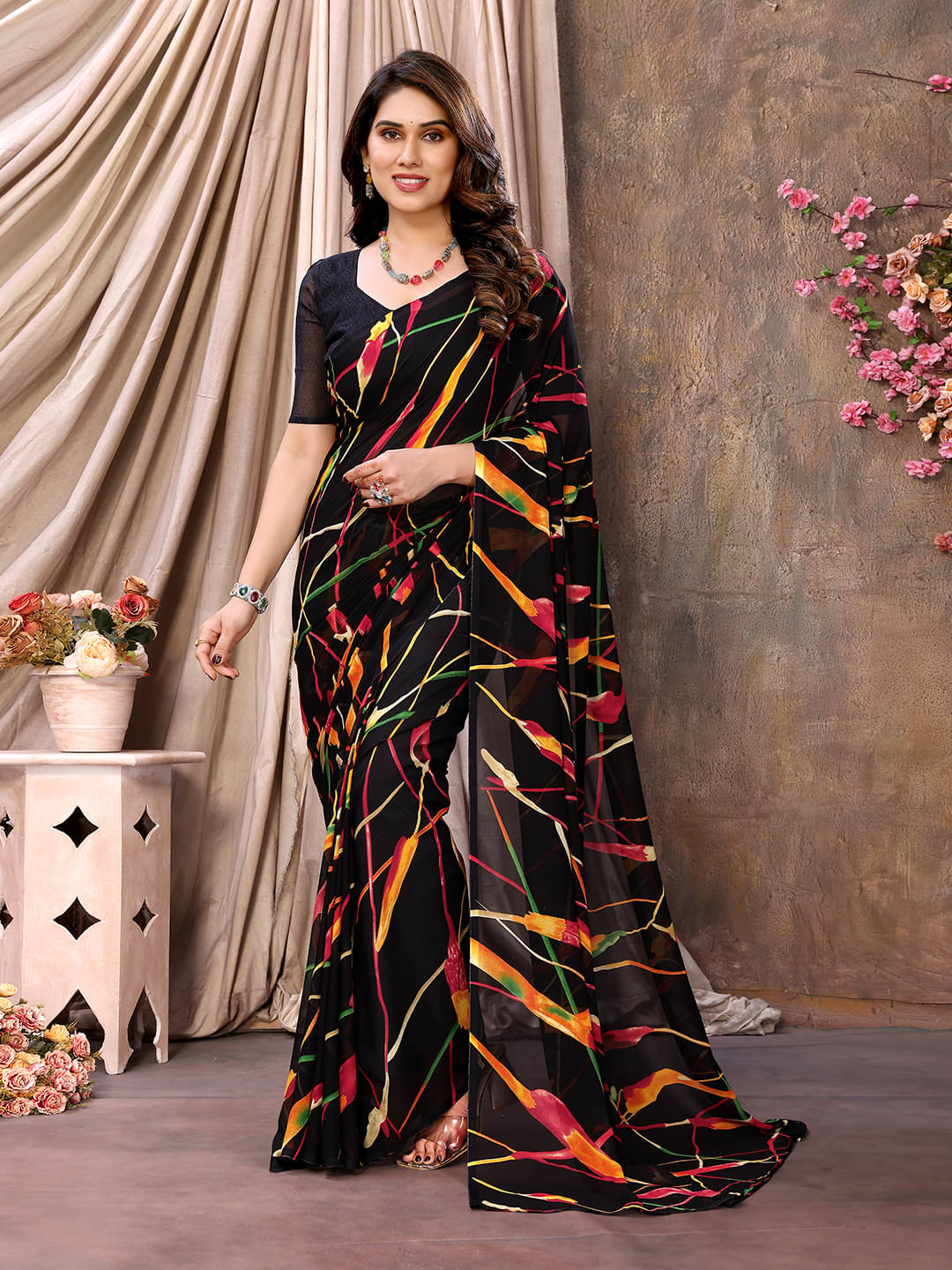 ANAND SAREES Georgette Printed Leheriya Saree With Unstitched Blouse Piece ( Black ) ANAND SAREES Georgette Printed Leheriya Saree With Unstitched Blouse Piece ( Black )
