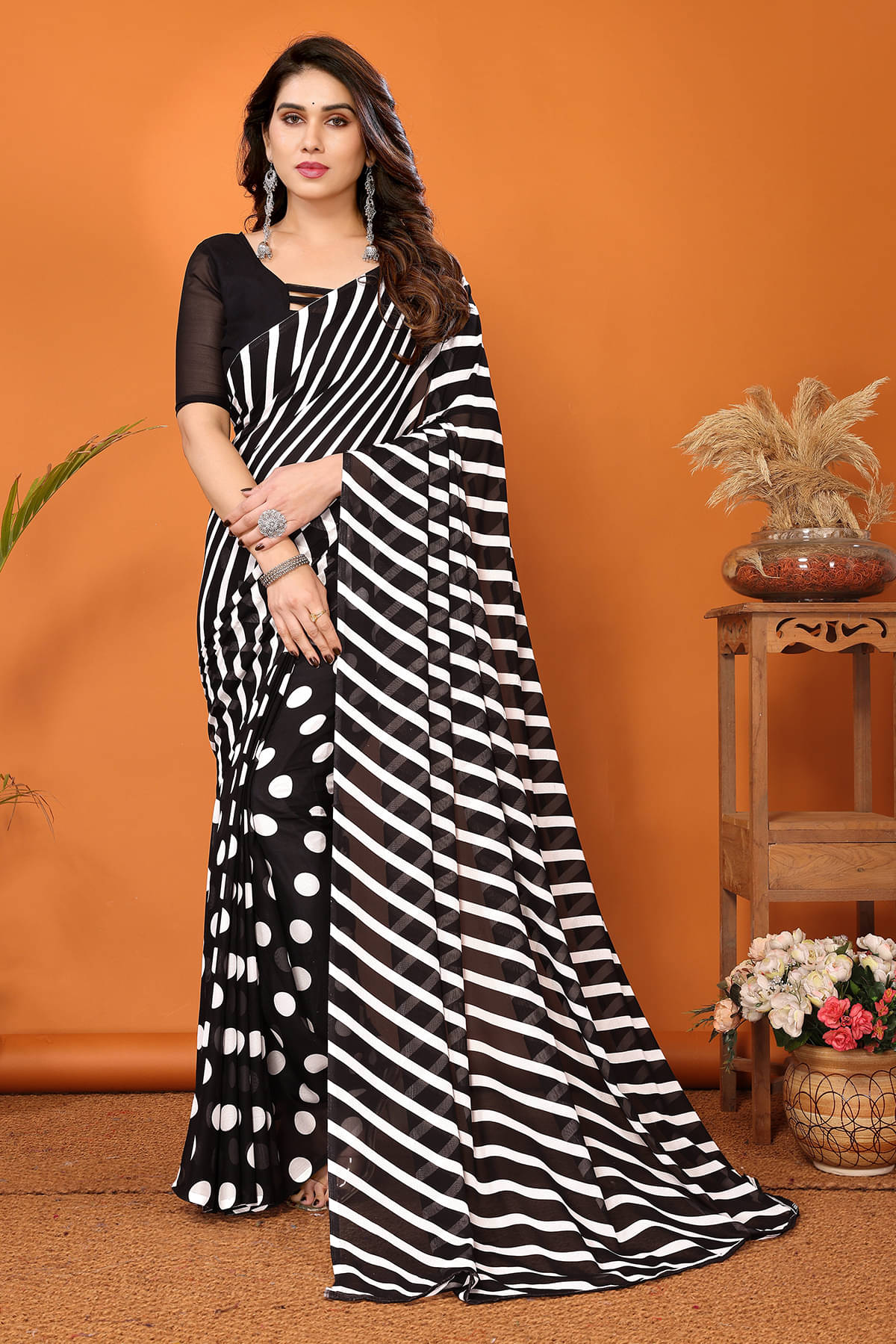 ANAND SAREES Georgette Printed Chanderi saree With Unstitched Blouse Piece ( Black ) ANAND SAREES Georgette Printed Chanderi saree With Unstitched Blouse Piece ( Black )