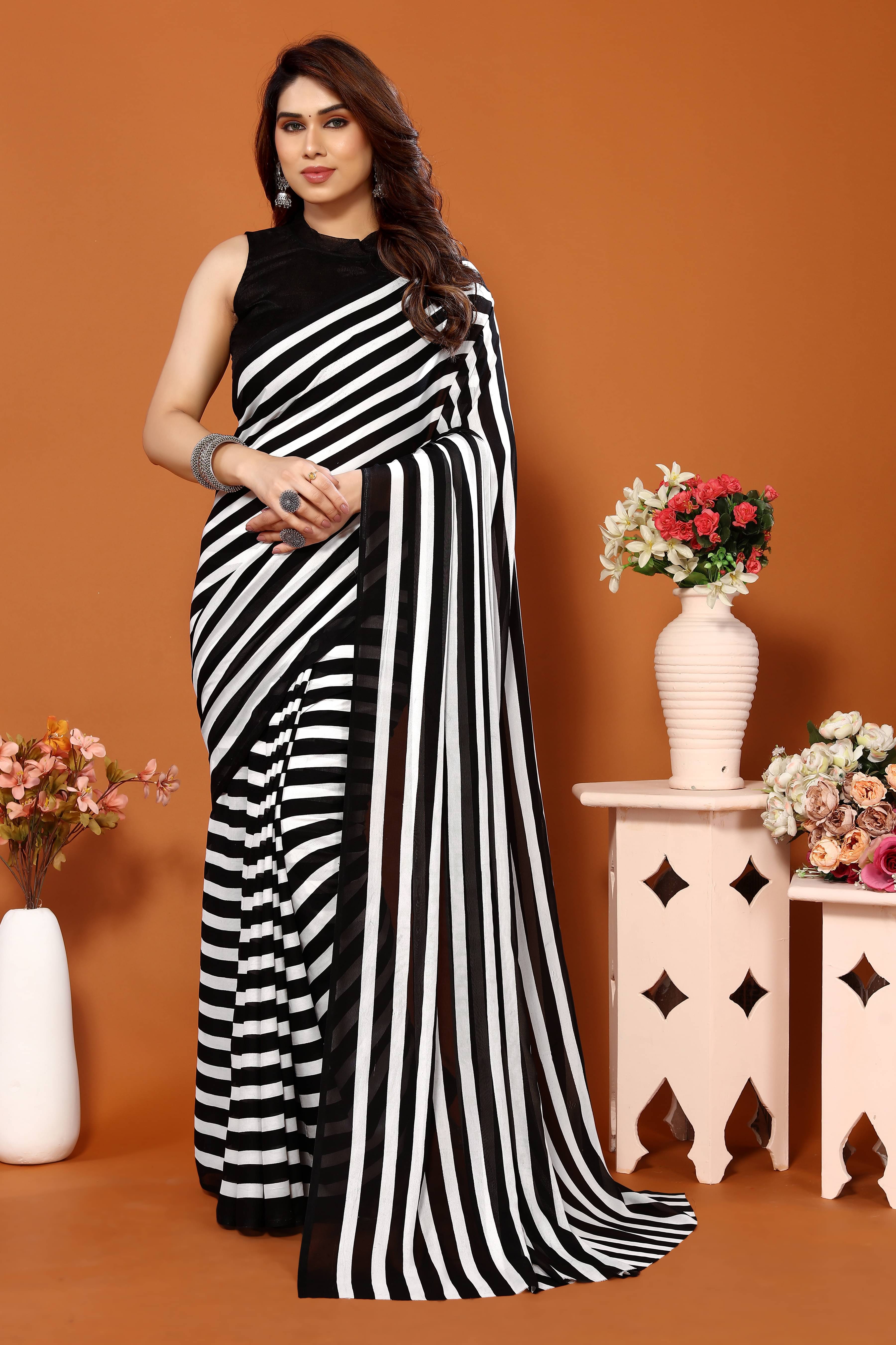 ANAND SAREES Georgette Printed Leheriya Saree With Unstitched Blouse Piece ( Black ) ANAND SAREES Georgette Printed Leheriya Saree With Unstitched Blouse Piece ( Black )