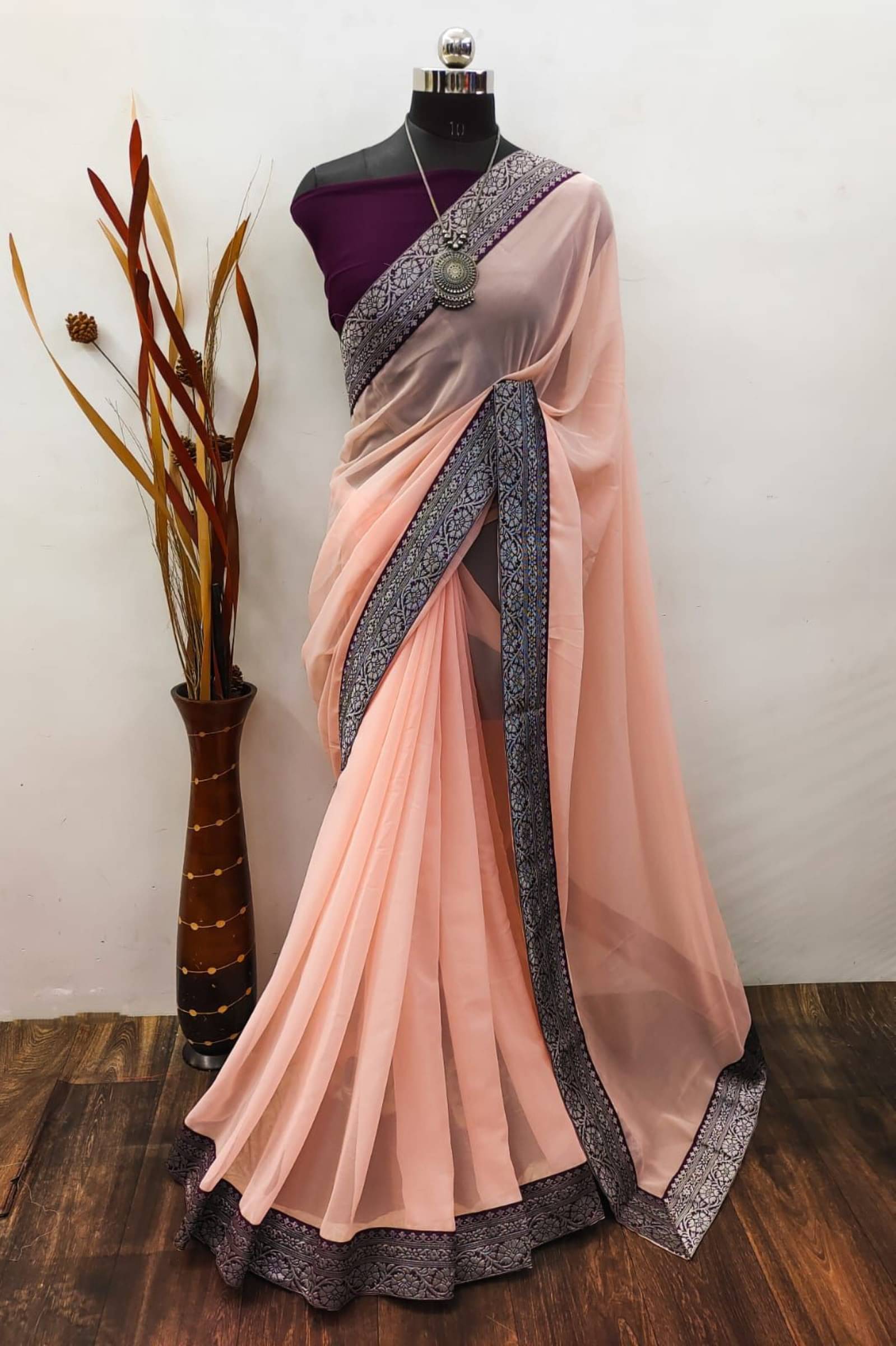    			Shree Mahantam Georgette Solid Saree With Unstitched Blouse Piece ( Peach )