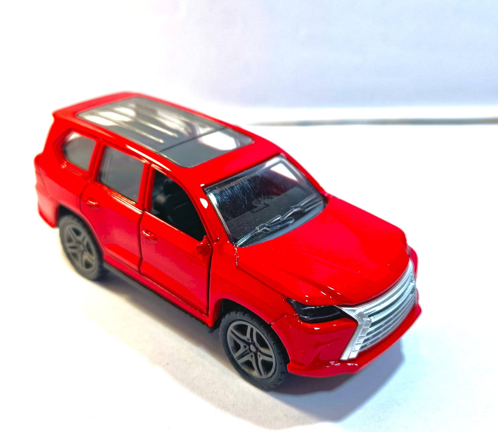 1:32 Scale Red Die-Cast SUV Toy Car – Openable Doors, Sunroof, Pull Back Action | Premium Metal Model for Kids & Collectors 1:32 Scale Red Die-Cast SUV Toy Car – Openable Doors, Sunroof, Pull Back Action | Premium Metal Model for Kids & Collectors