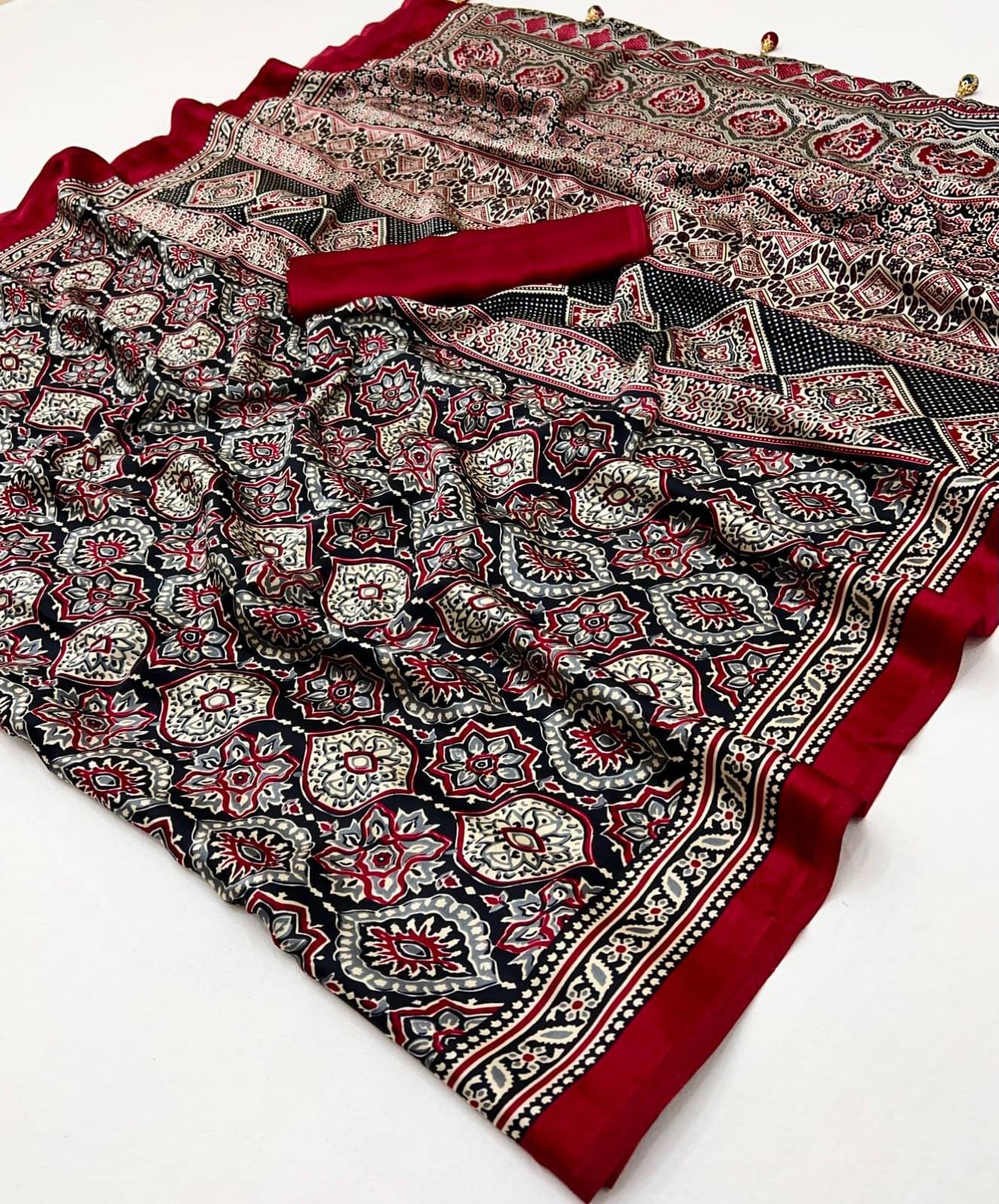 SHIRODHARI Satin Printed Sambalpuri Saree With Unstitched Blouse Piece ( Multicolor 1 ) SHIRODHARI Satin Printed Sambalpuri Saree With Unstitched Blouse Piece ( Multicolor 1 )