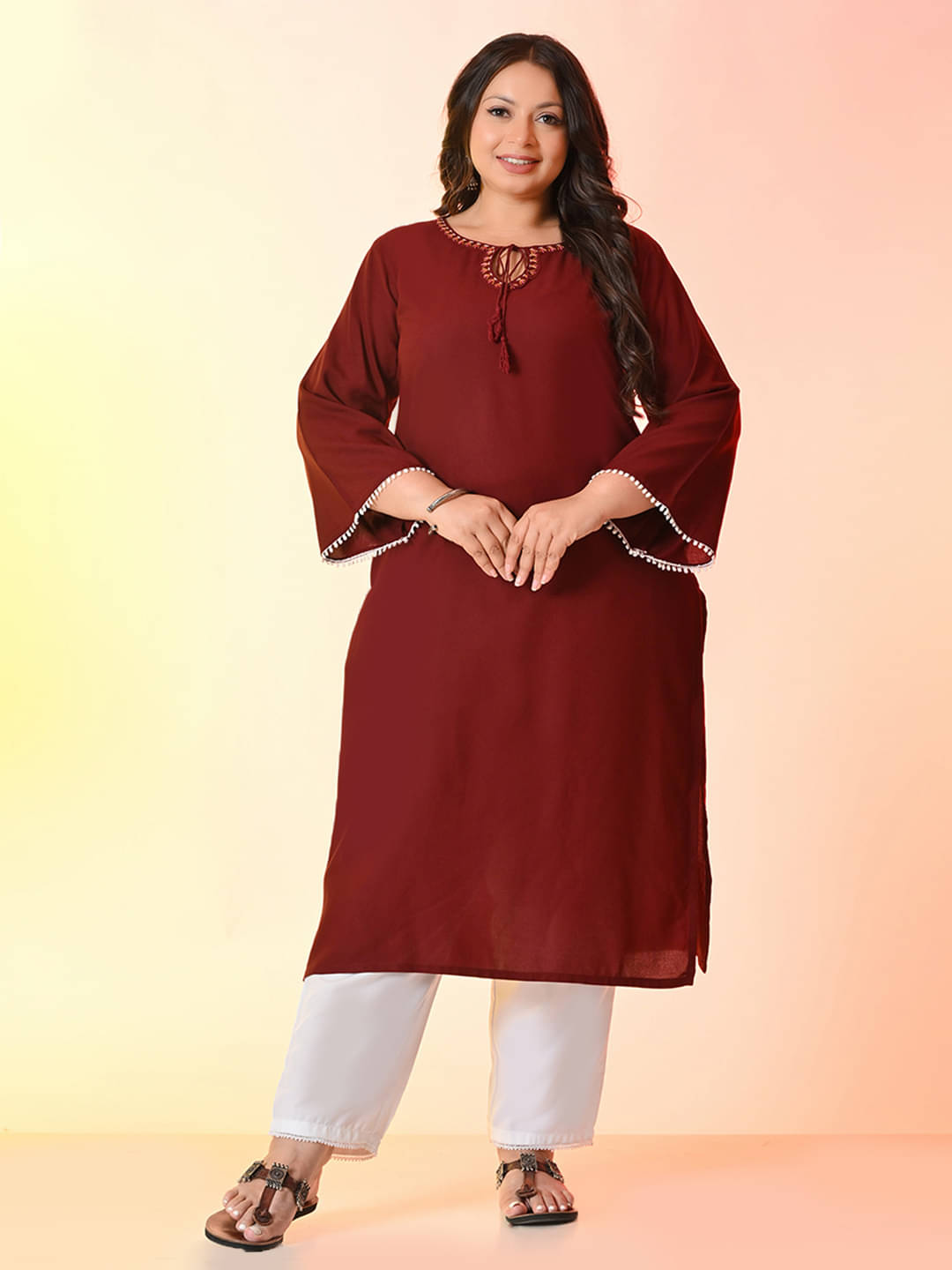     			PrettyPlus by Desinoor.com Women Viscose Rayon Embroidered Straight Kurti ( Rust )